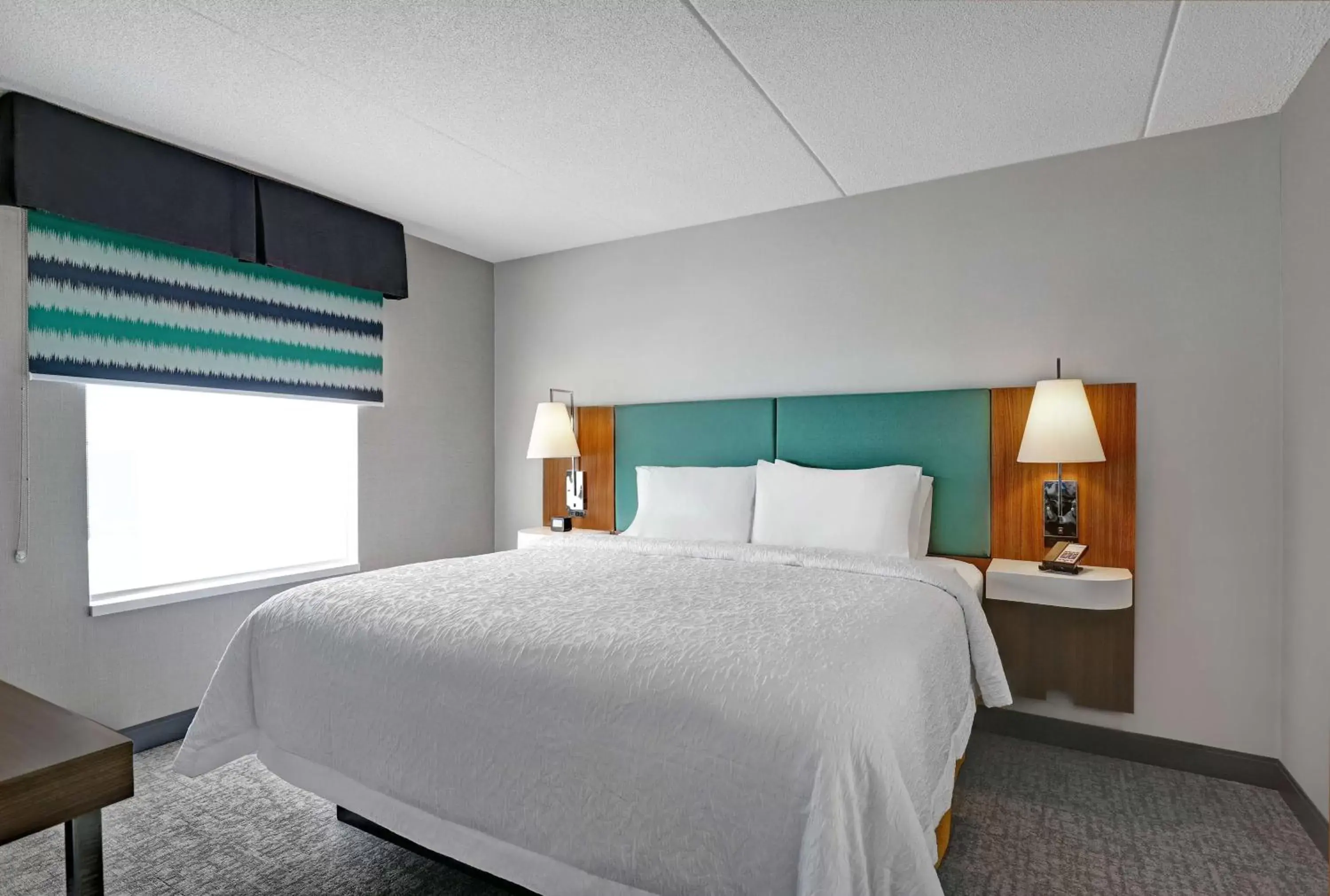 Bed in Hampton Inn & Suites Belleville