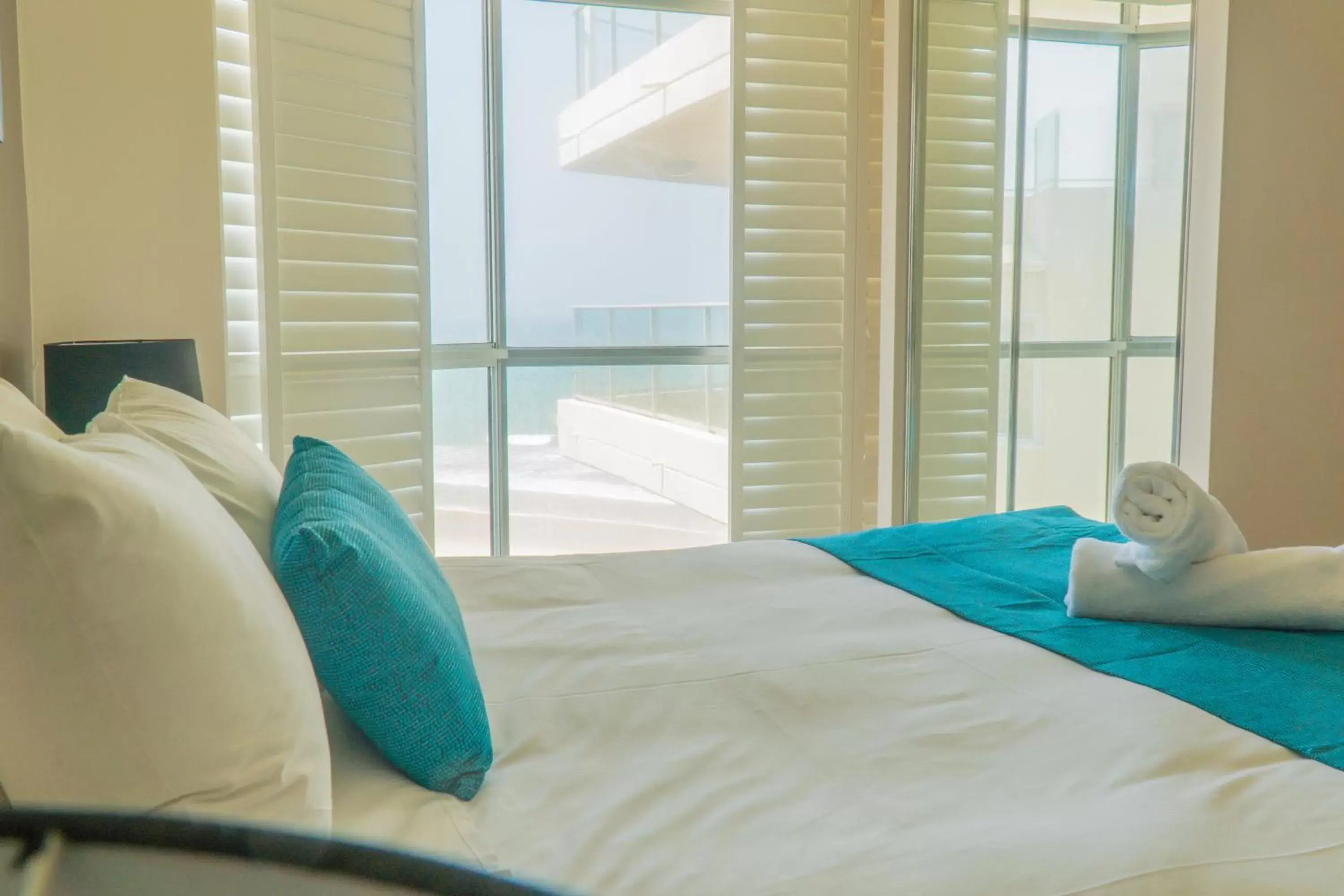 Bed in Foreshore Beachfront Apartments