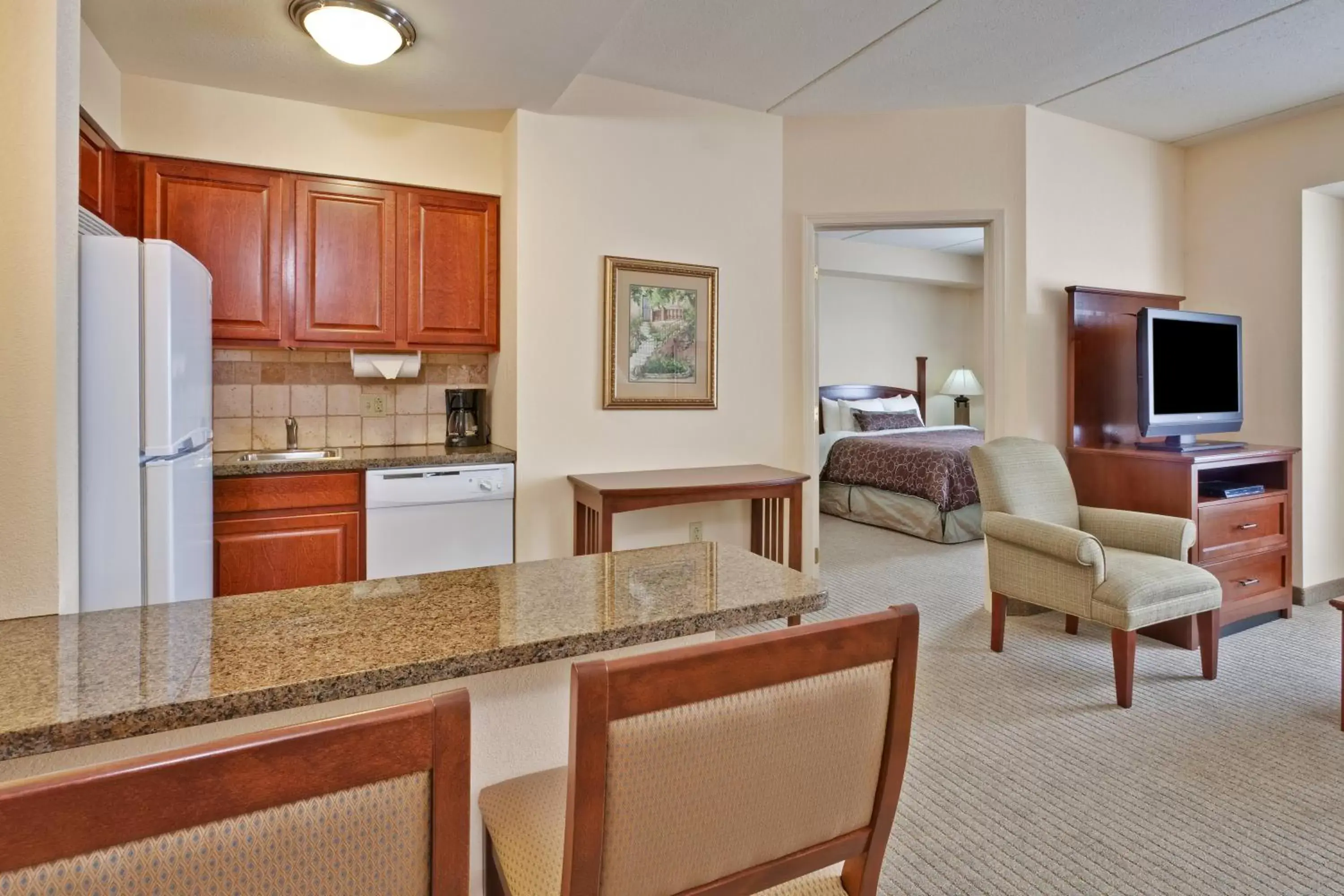Photo of the whole room, Kitchen/Kitchenette in Staybridge Suites Buffalo, an IHG Hotel