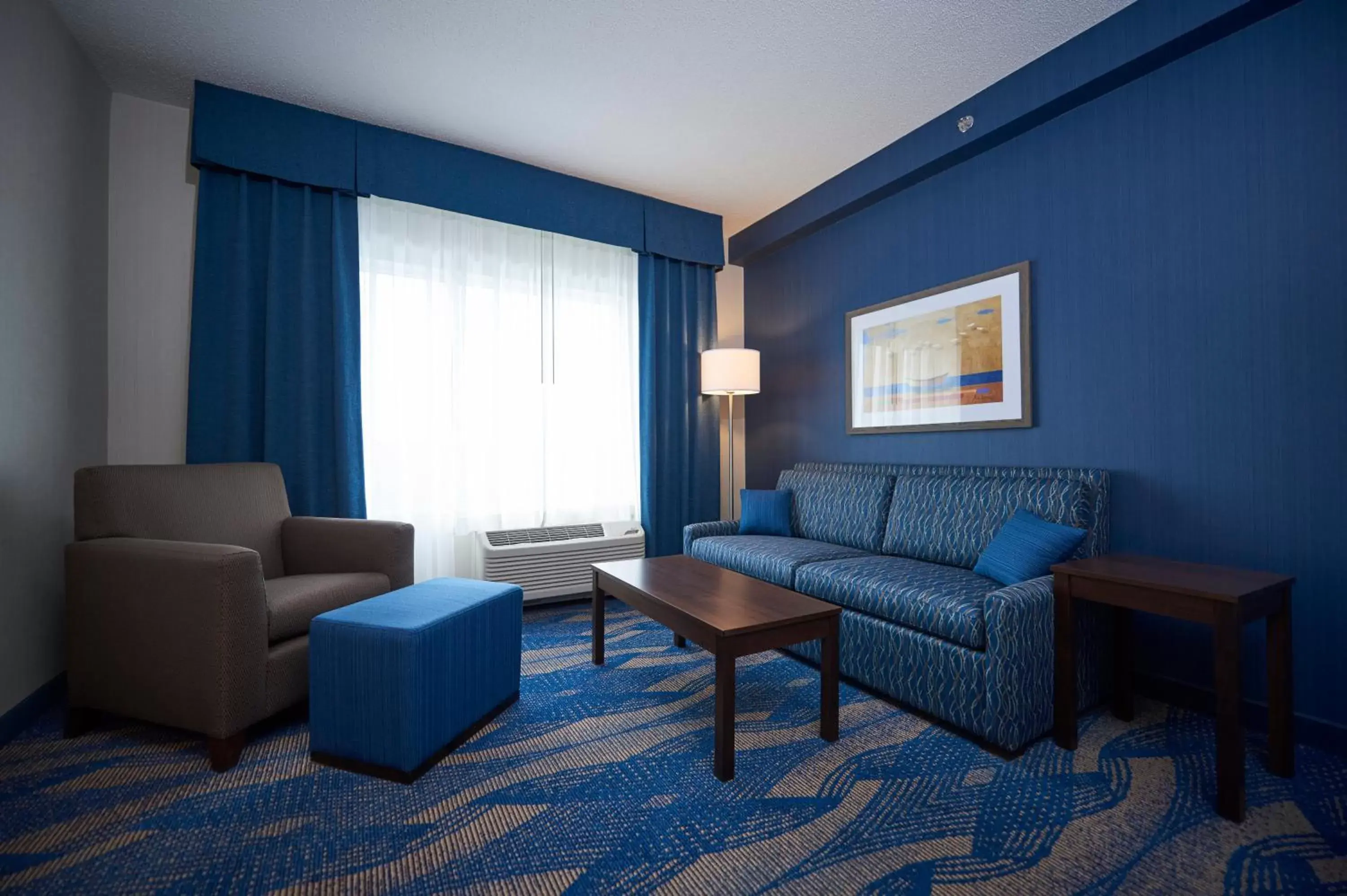 Photo of the whole room, Seating Area in Holiday Inn Express & Suites St. John's Airport, an IHG Hotel