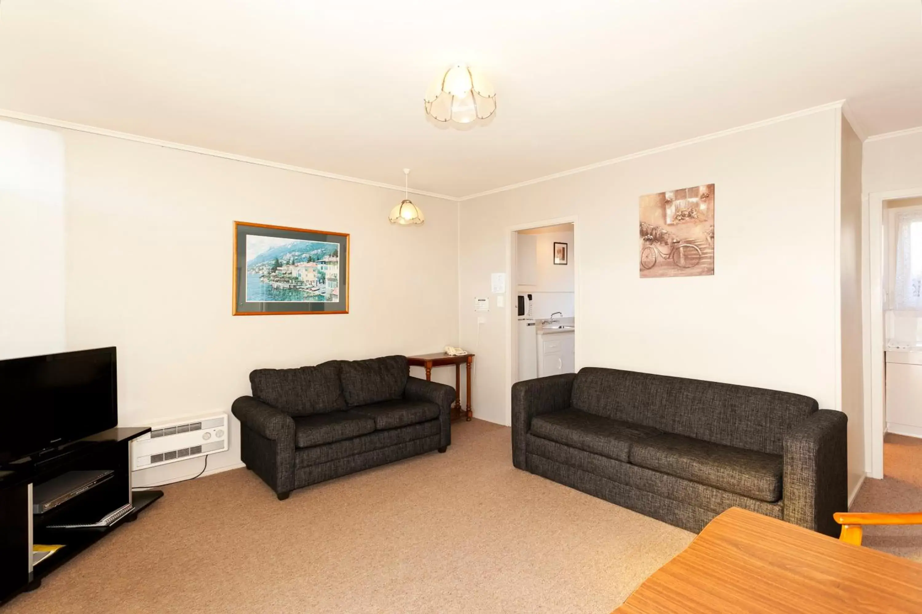 Living room, Seating Area in Merivale Court Motel & Apartments