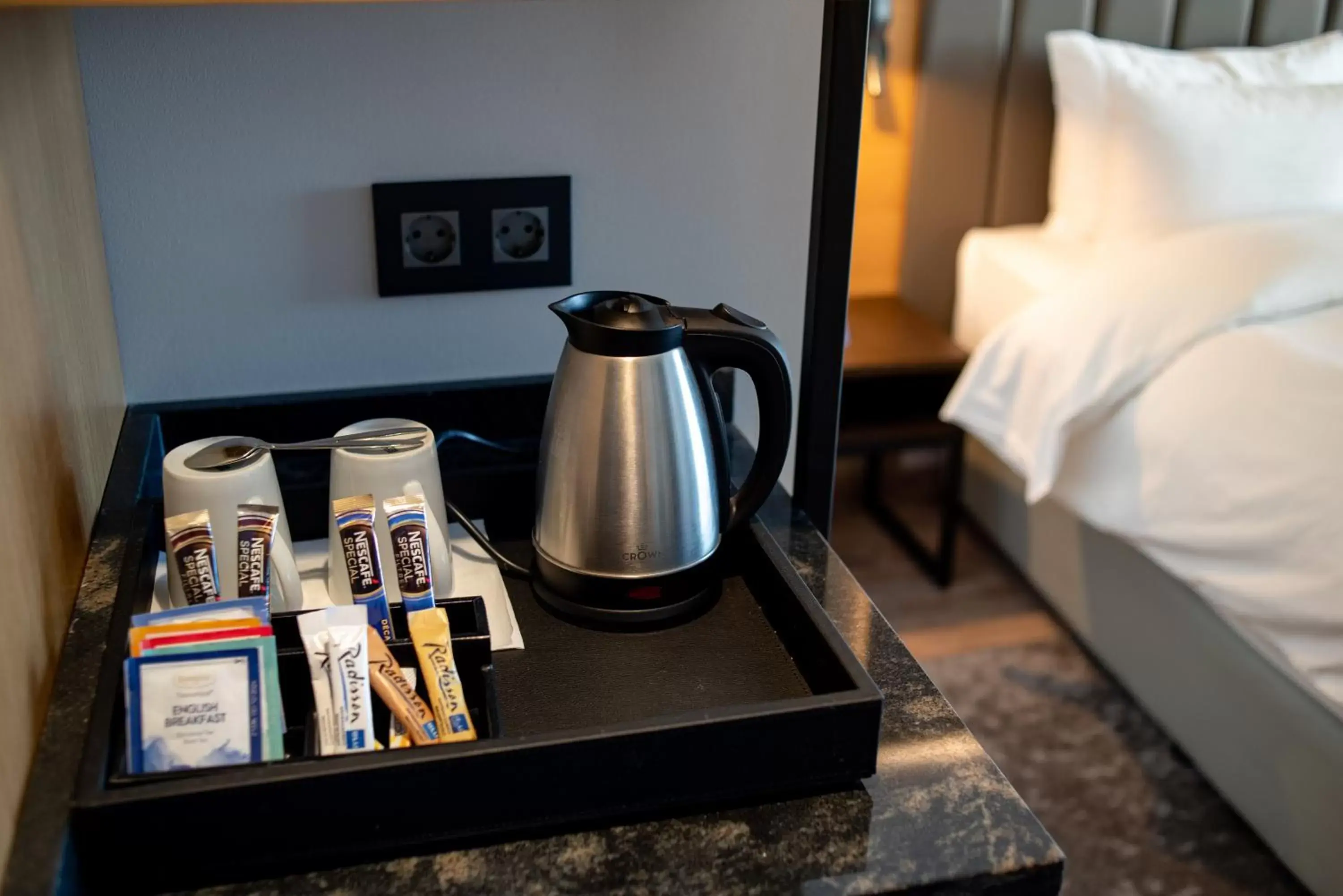 Coffee/tea facilities, Bed in Radisson Blu Hotel Antananarivo Waterfront Coffee/tea facilities, Bed in Radisson Blu Hotel Antananarivo Waterfront