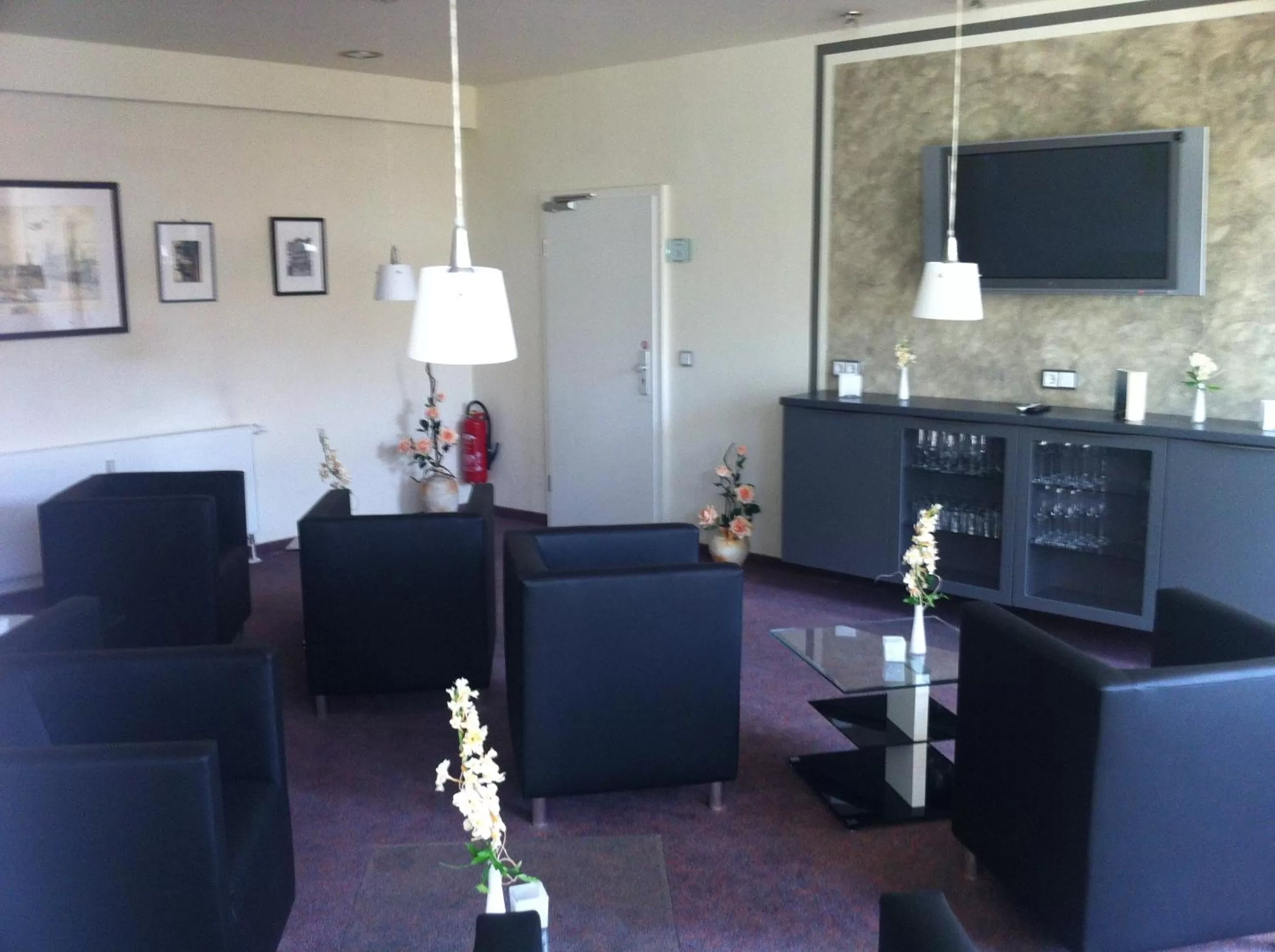 Communal lounge/ TV room in Pension an der Porzellan-Manufaktur