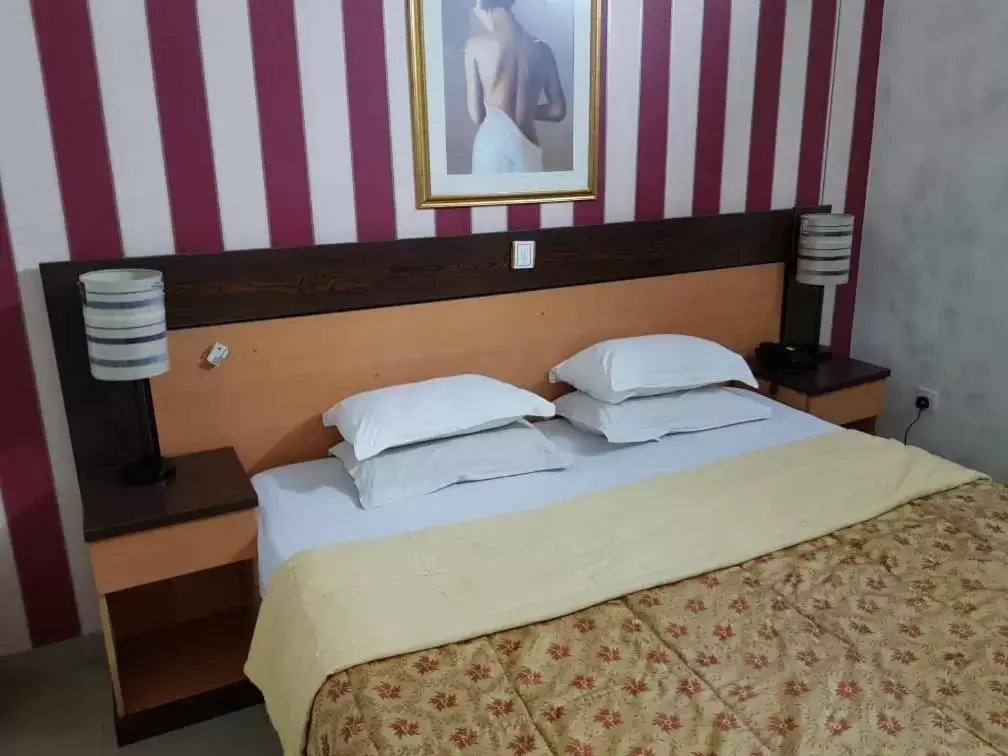 Bed in Citilodge Hotel