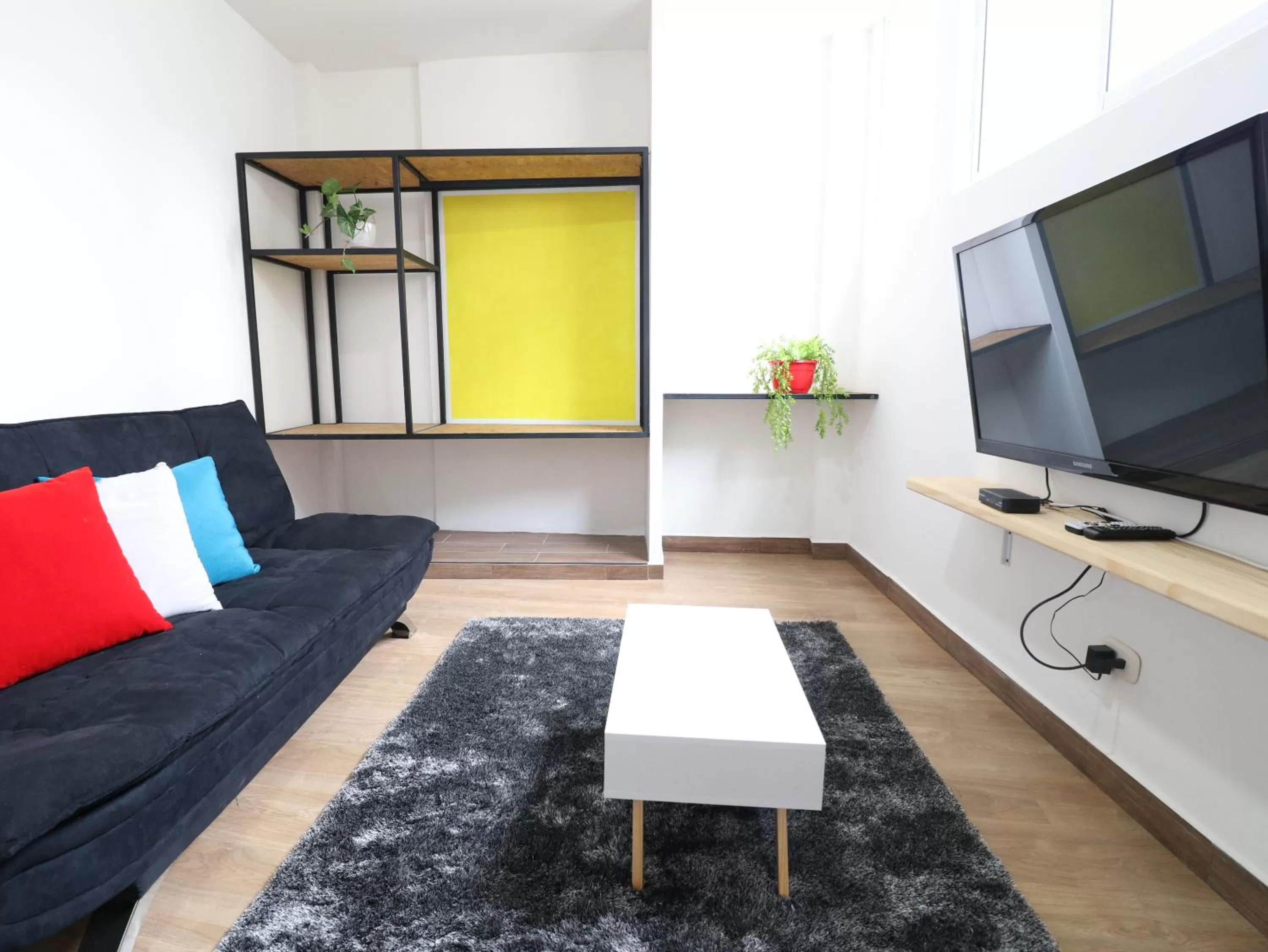 Bedroom, Seating Area in 554 Apartments