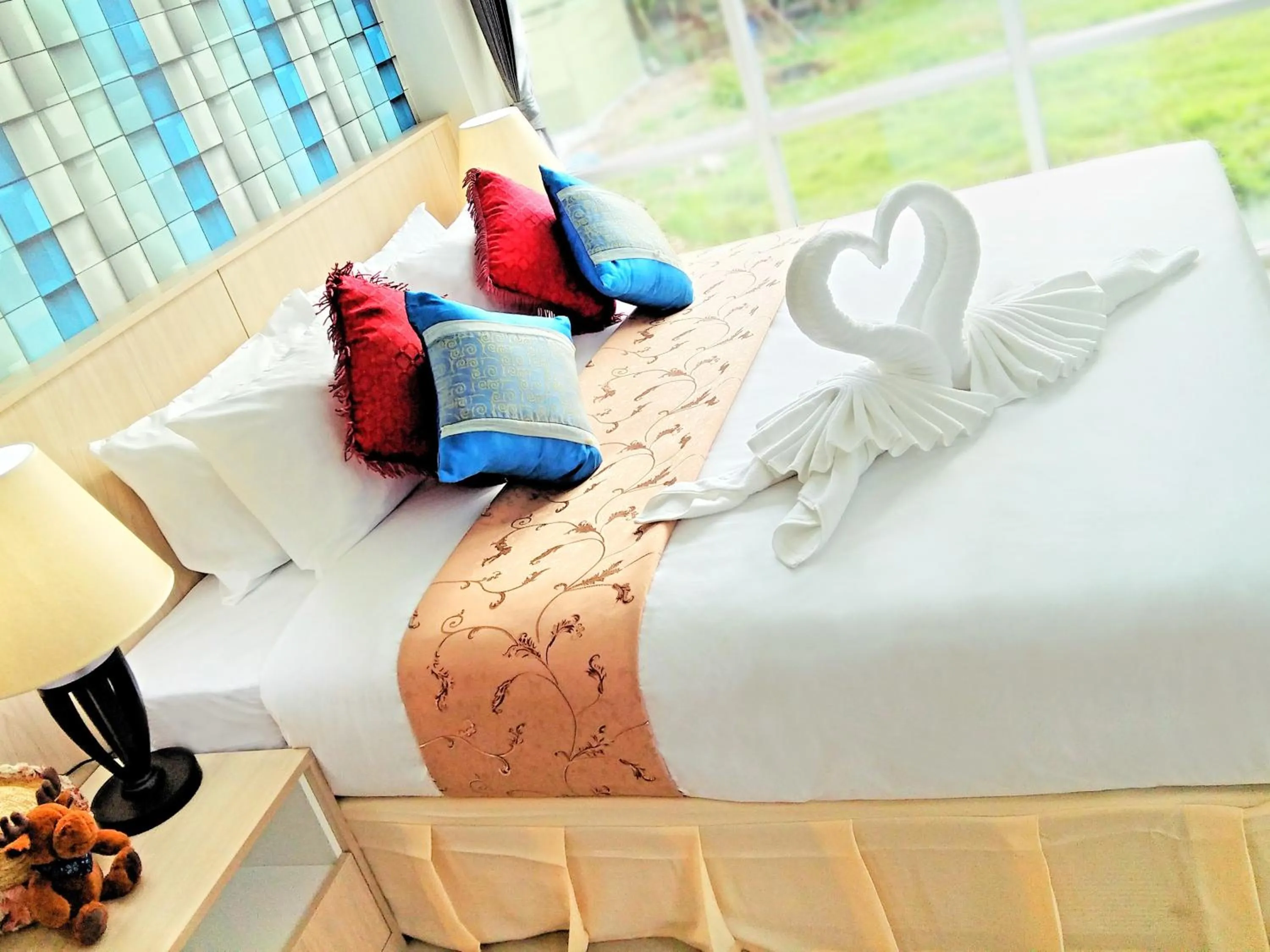 Bed in The Wings Boutique Hotels Krabi Ko Lanta