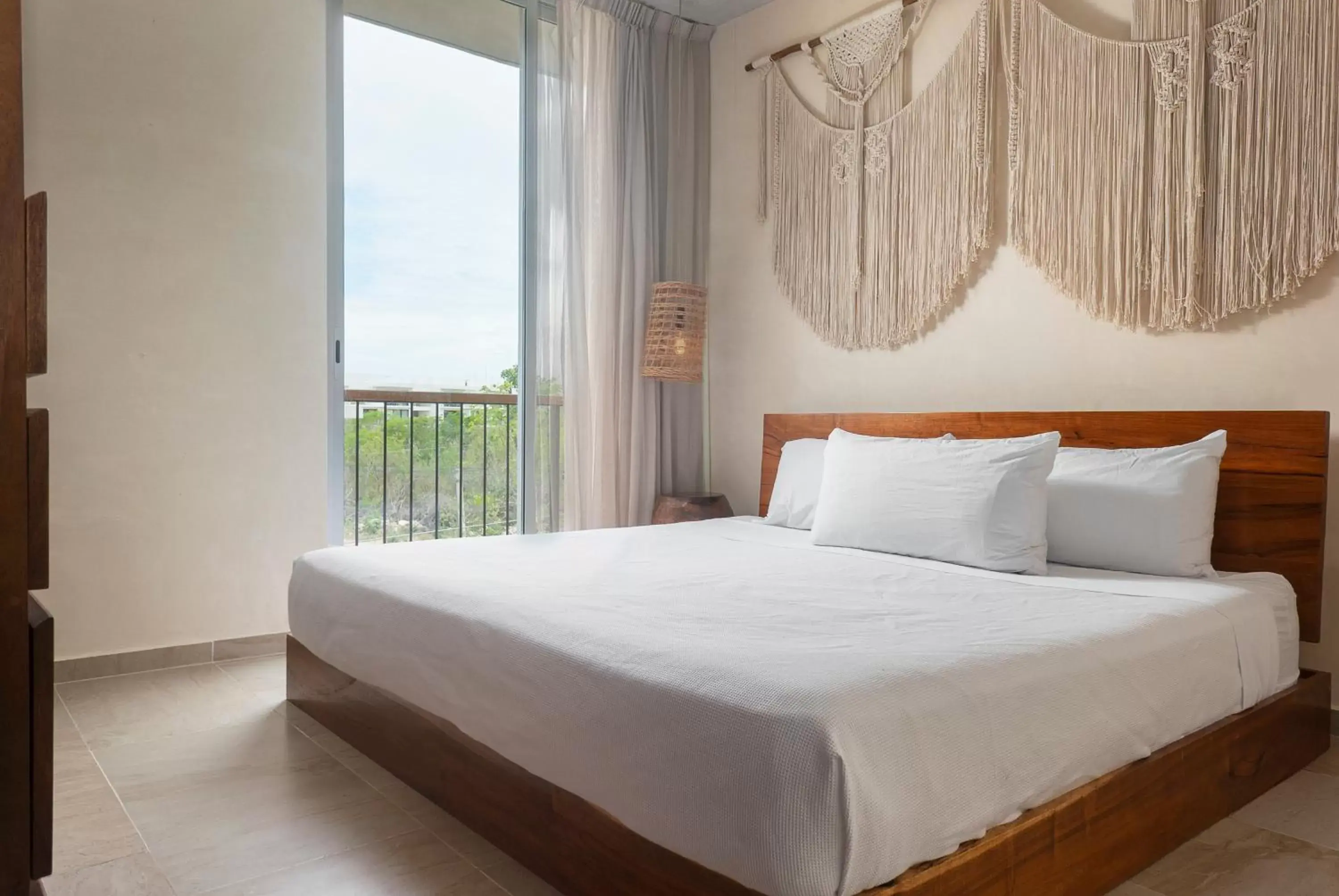 Bed in ARUNA TULUM-Luxury Studios & Apartments