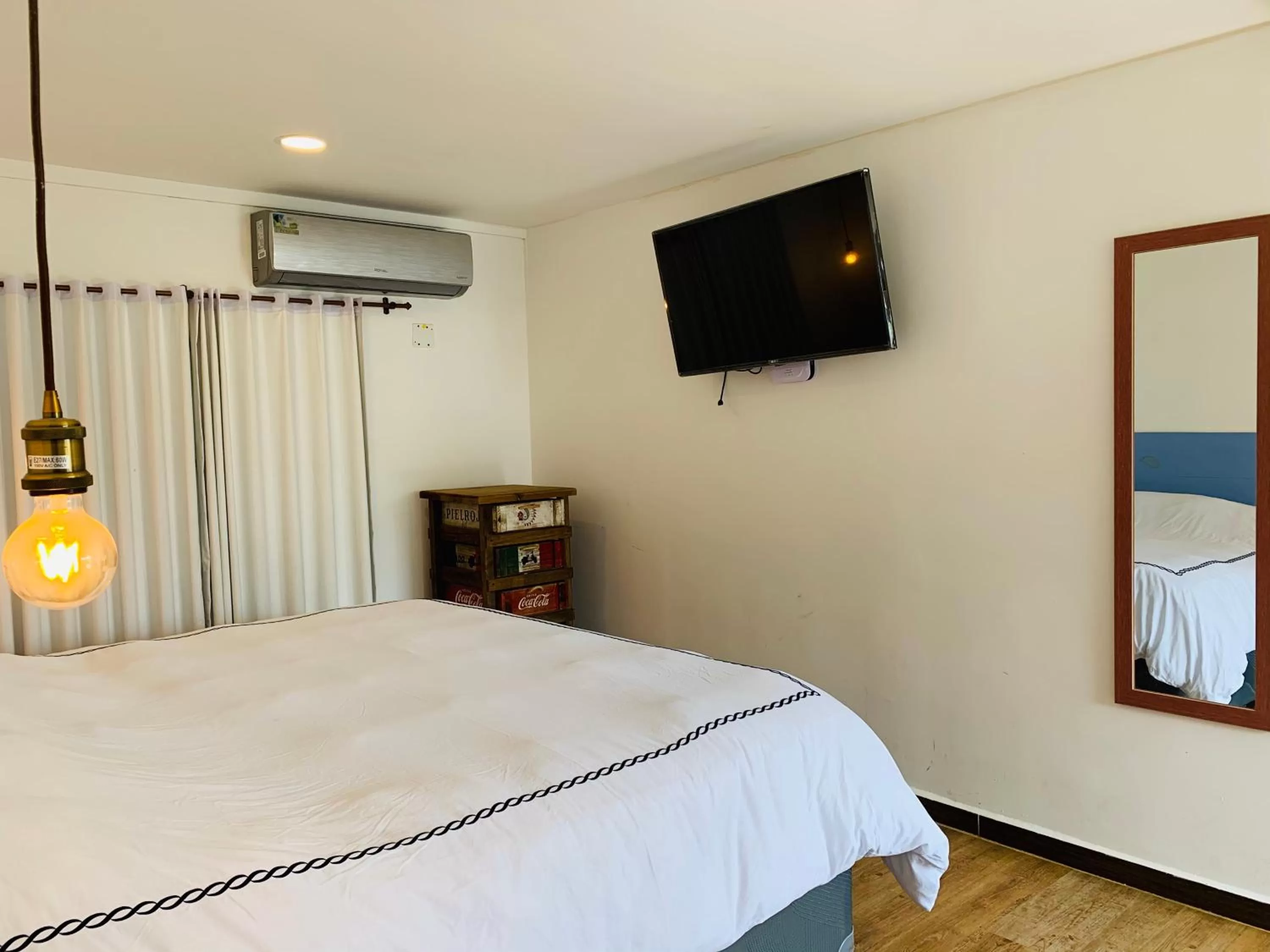 Bed in Be Happy Hotel