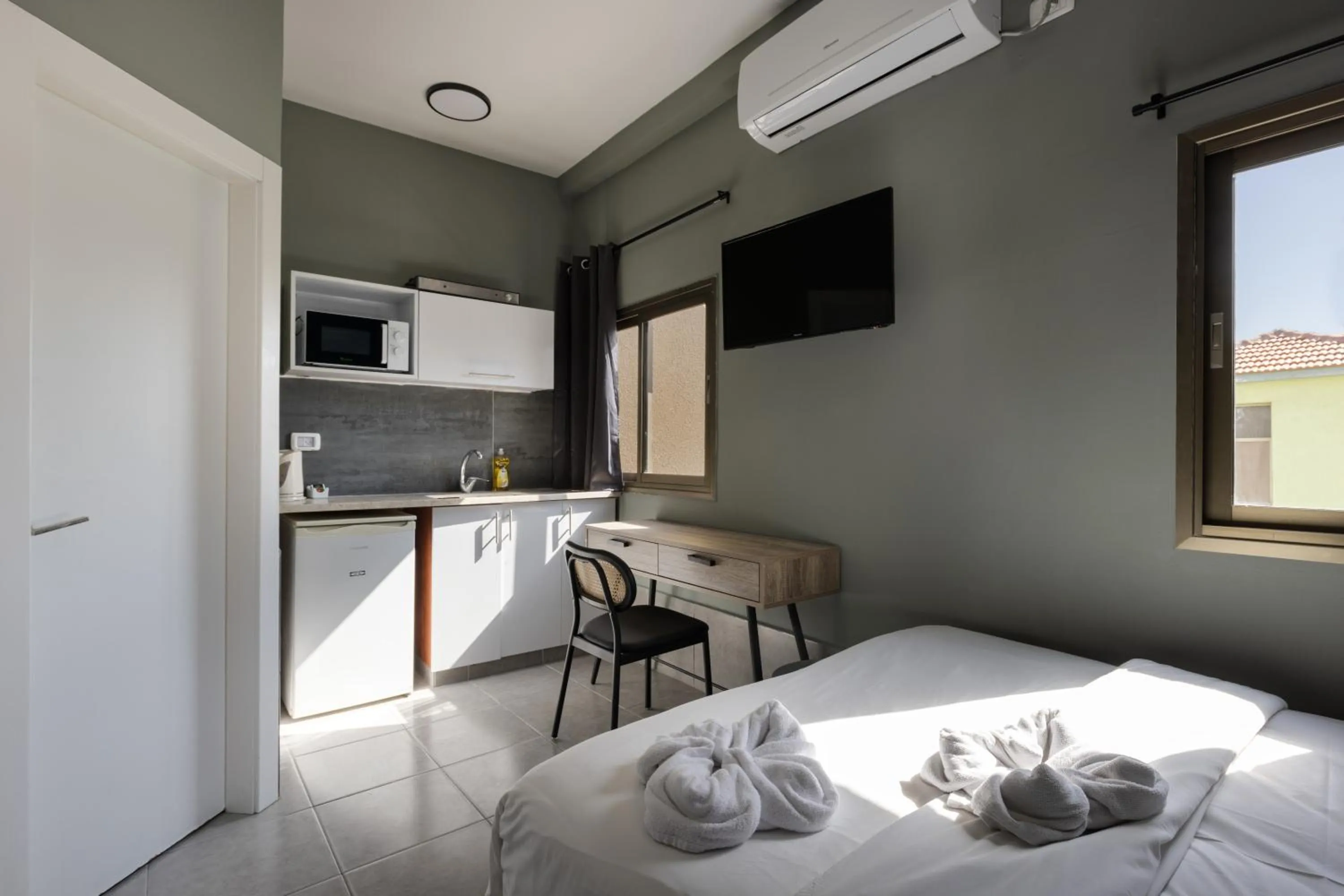 Photo of the whole room, Bed in Liber Tel Aviv Sea Shore Suites BY RAPHAEL HOTELS