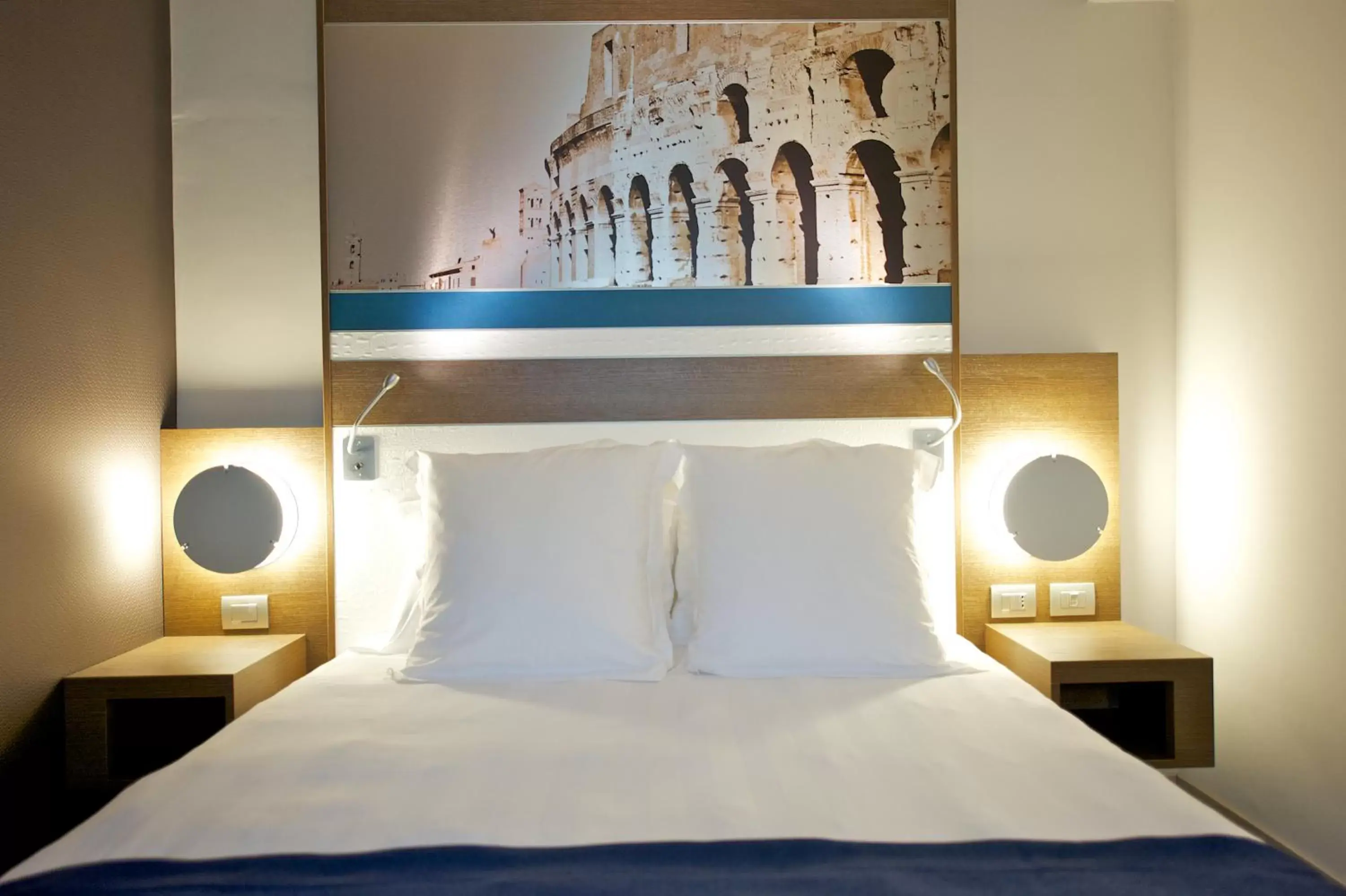 Bed in Mercure Roma Centro Colosseo