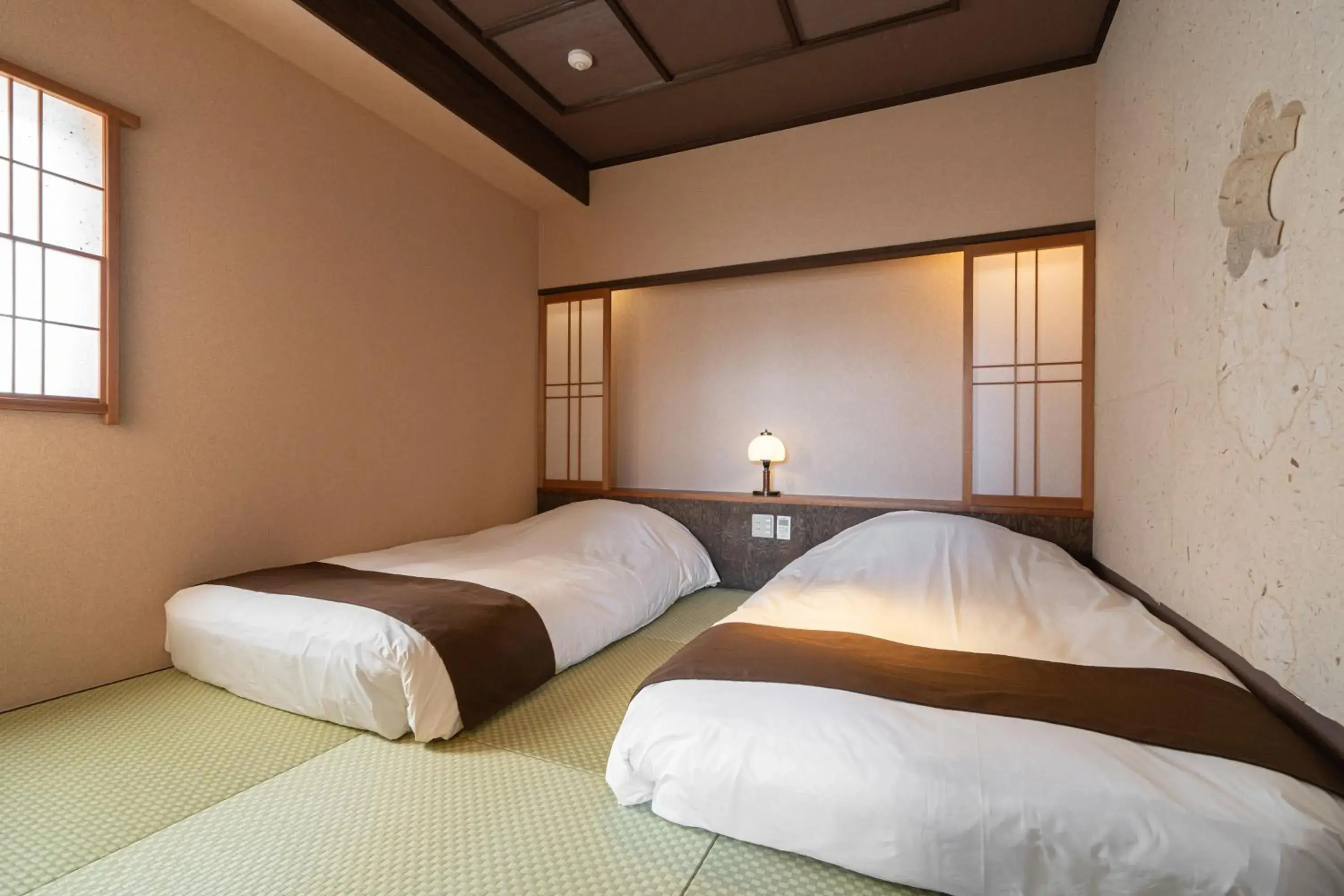 Bedroom, Bed in Tokinoniwa Hotel