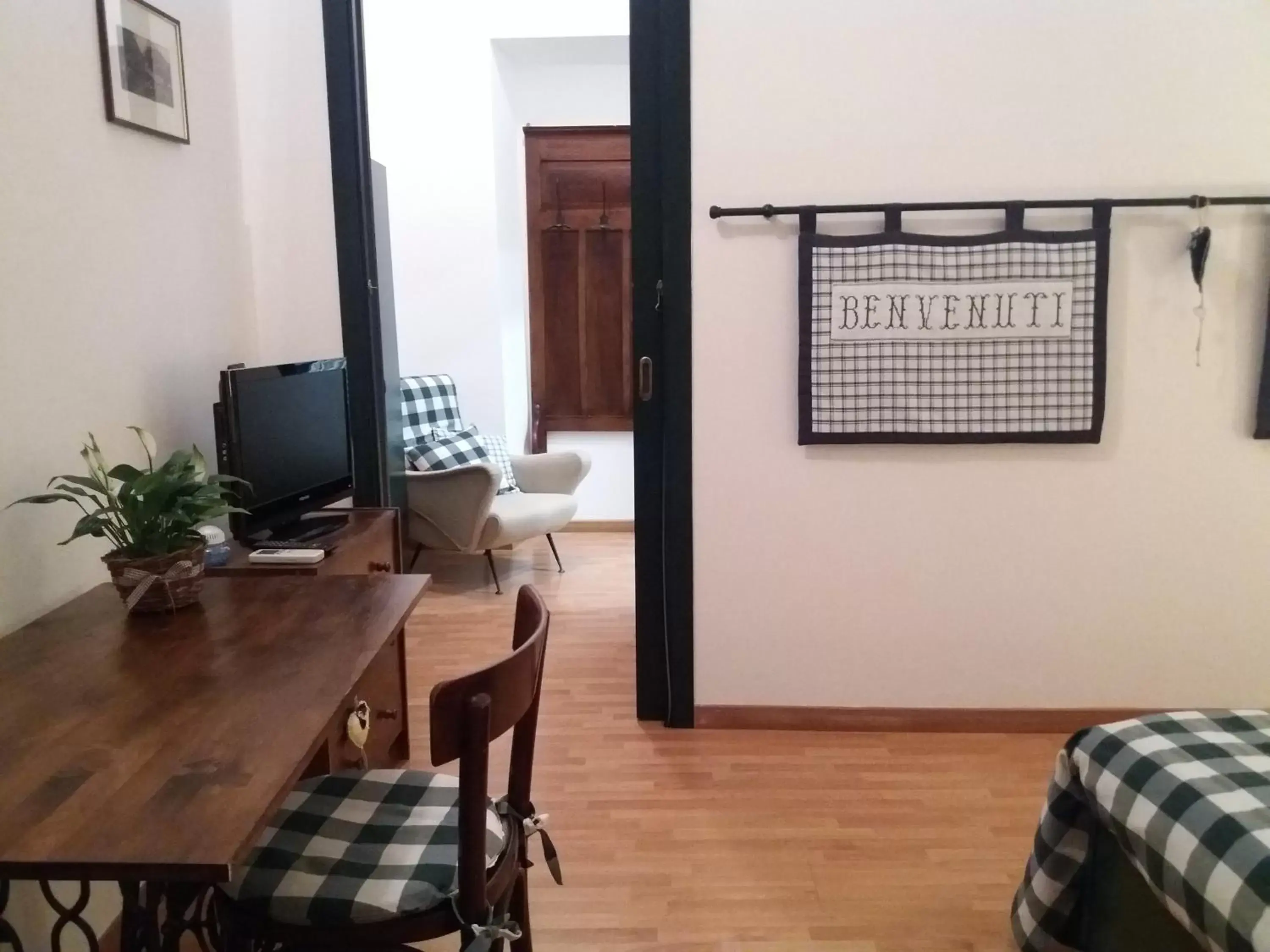 Photo of the whole room, TV/Entertainment Center in B&B il Cortile Malpensa