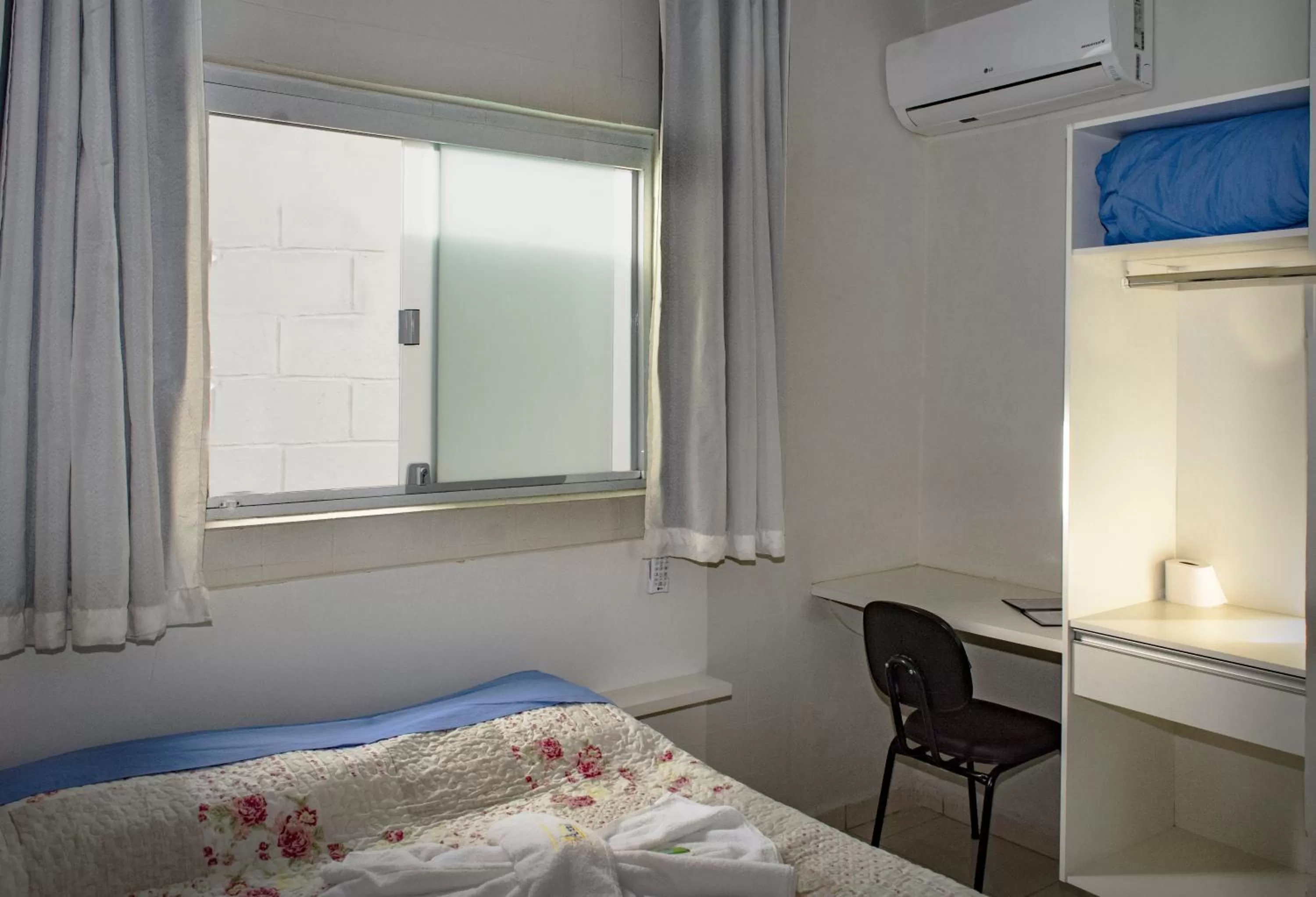 Bed in Pousada Araxá