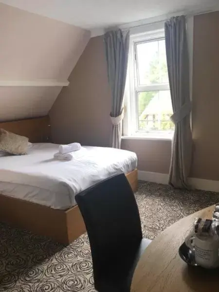 Bed in Penny Farthing Hotel & Cottages