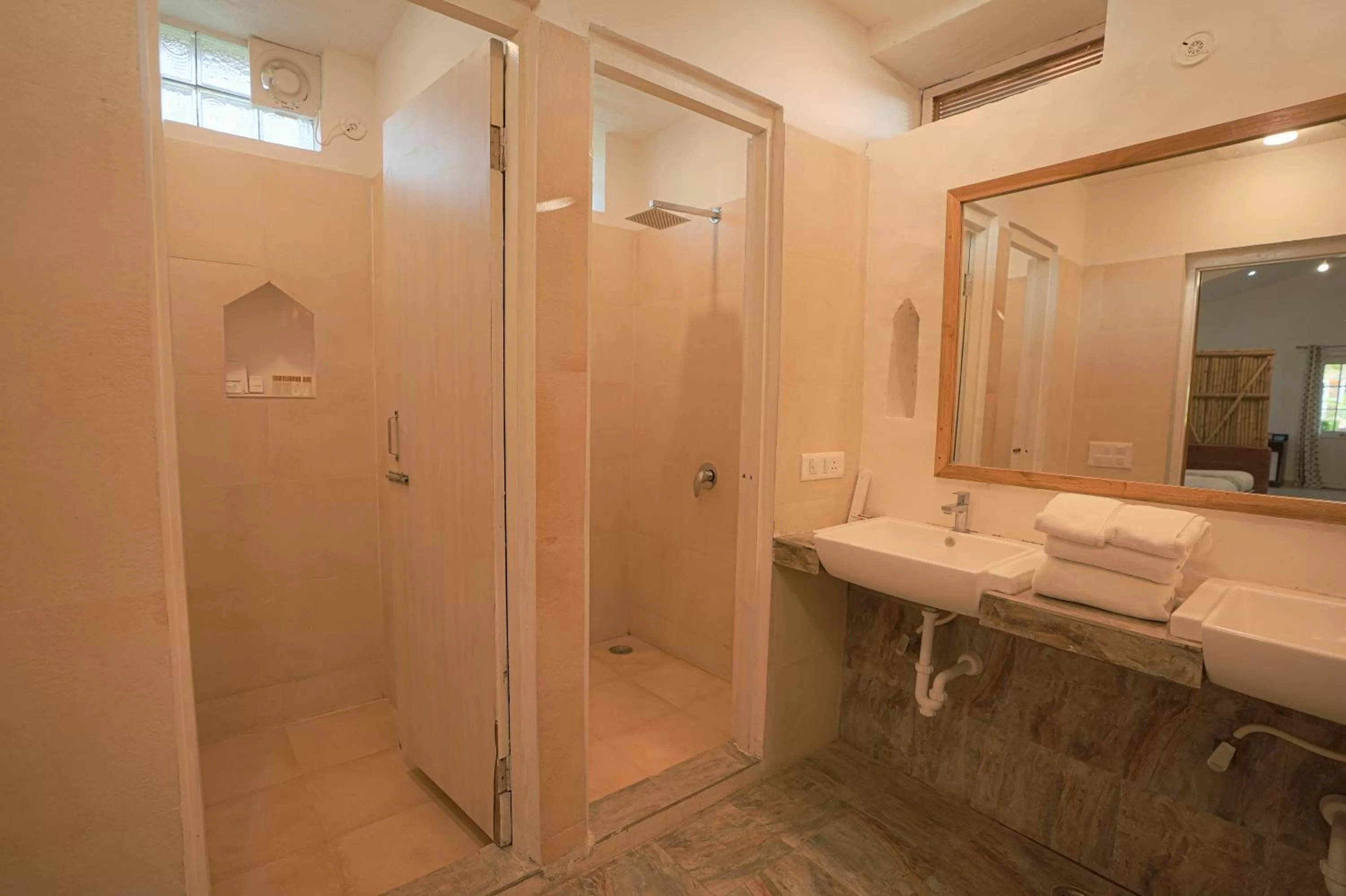 Bathroom in Astroport Sariska Treetop by Eight Continents
