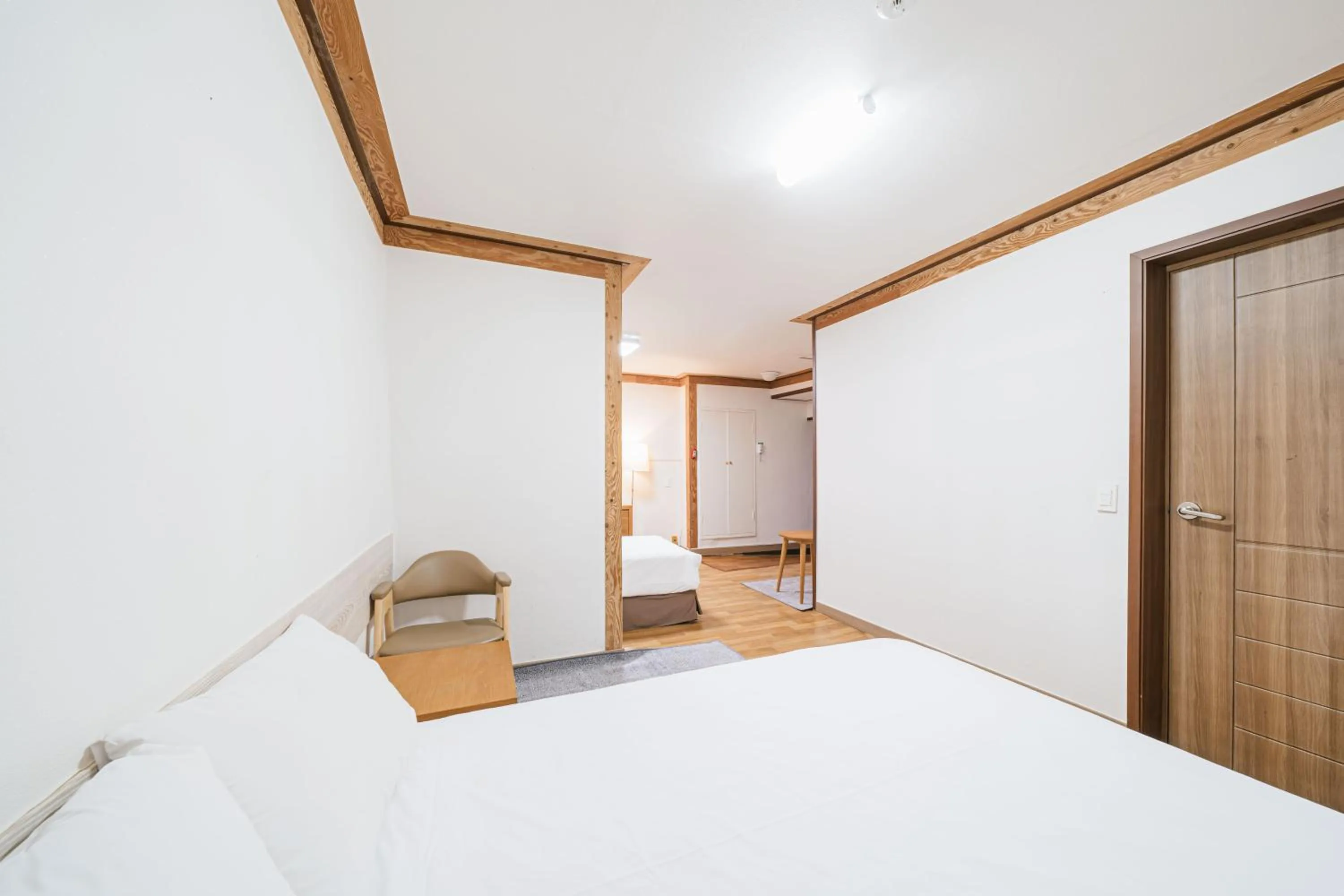 Bed in Jeju Miracle Hotel