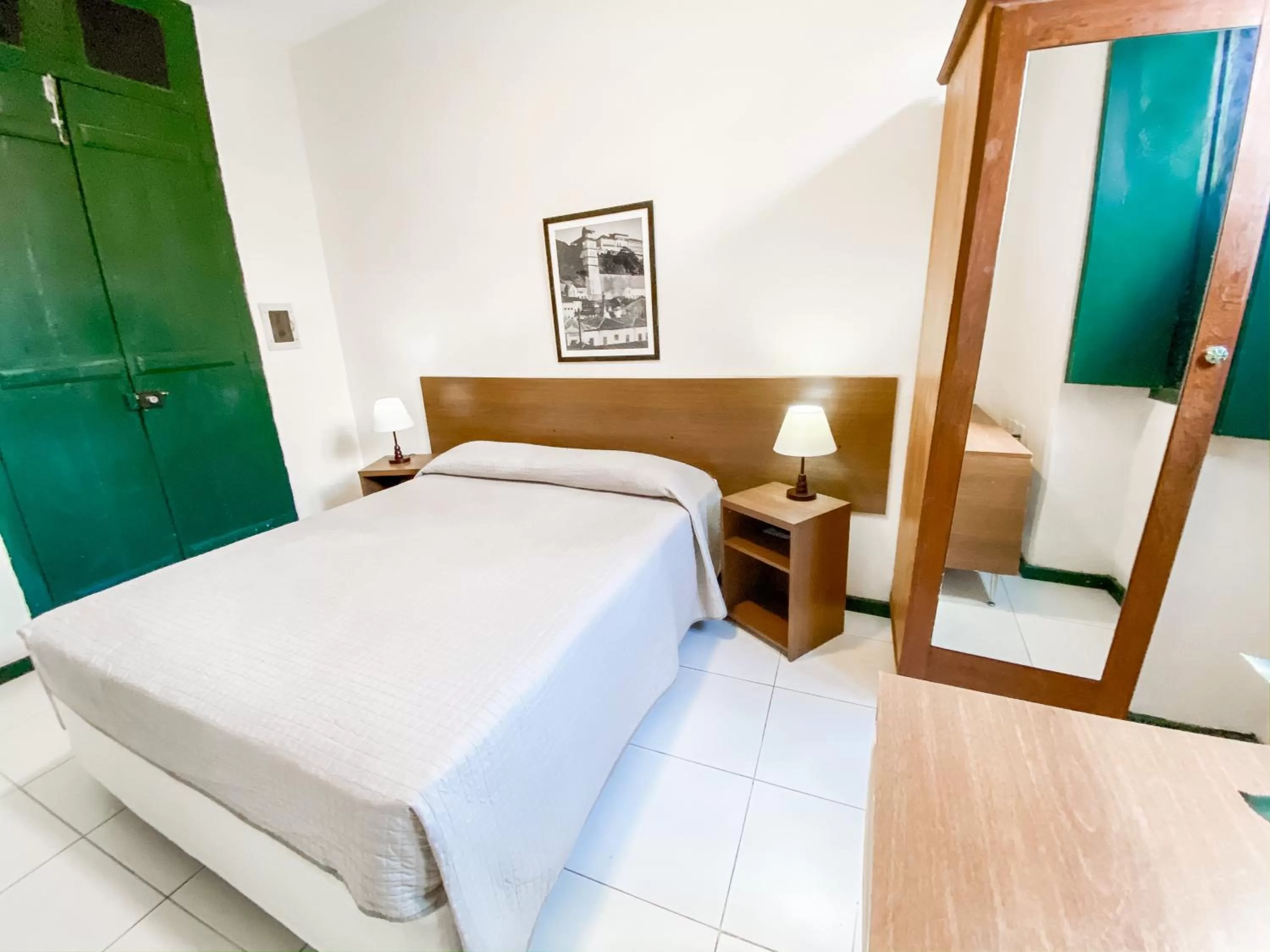 Bed in Pousada Colonial Chile