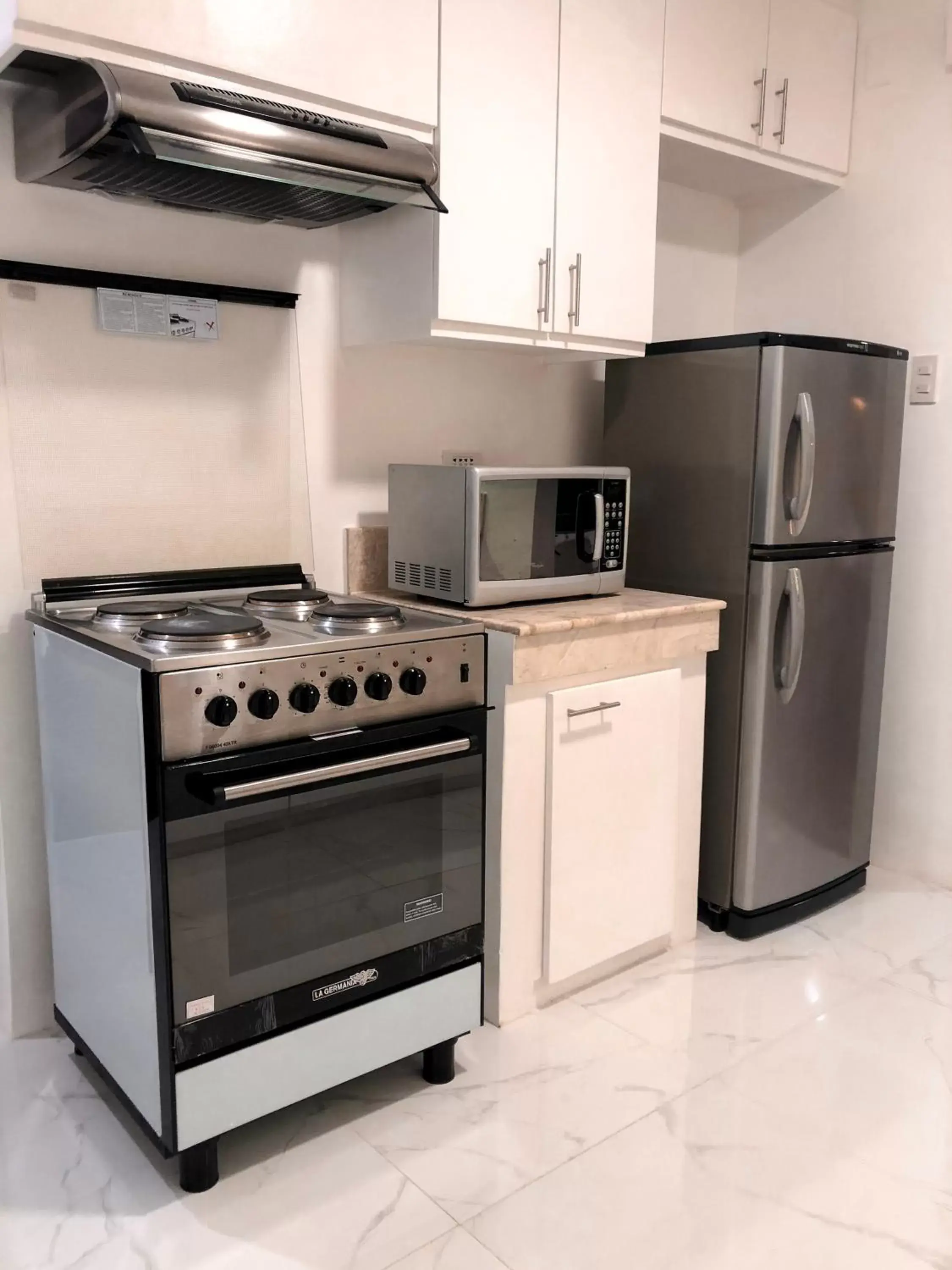 Kitchen or kitchenette, Kitchen/Kitchenette in Parque España Residence Hotel Managed by HII