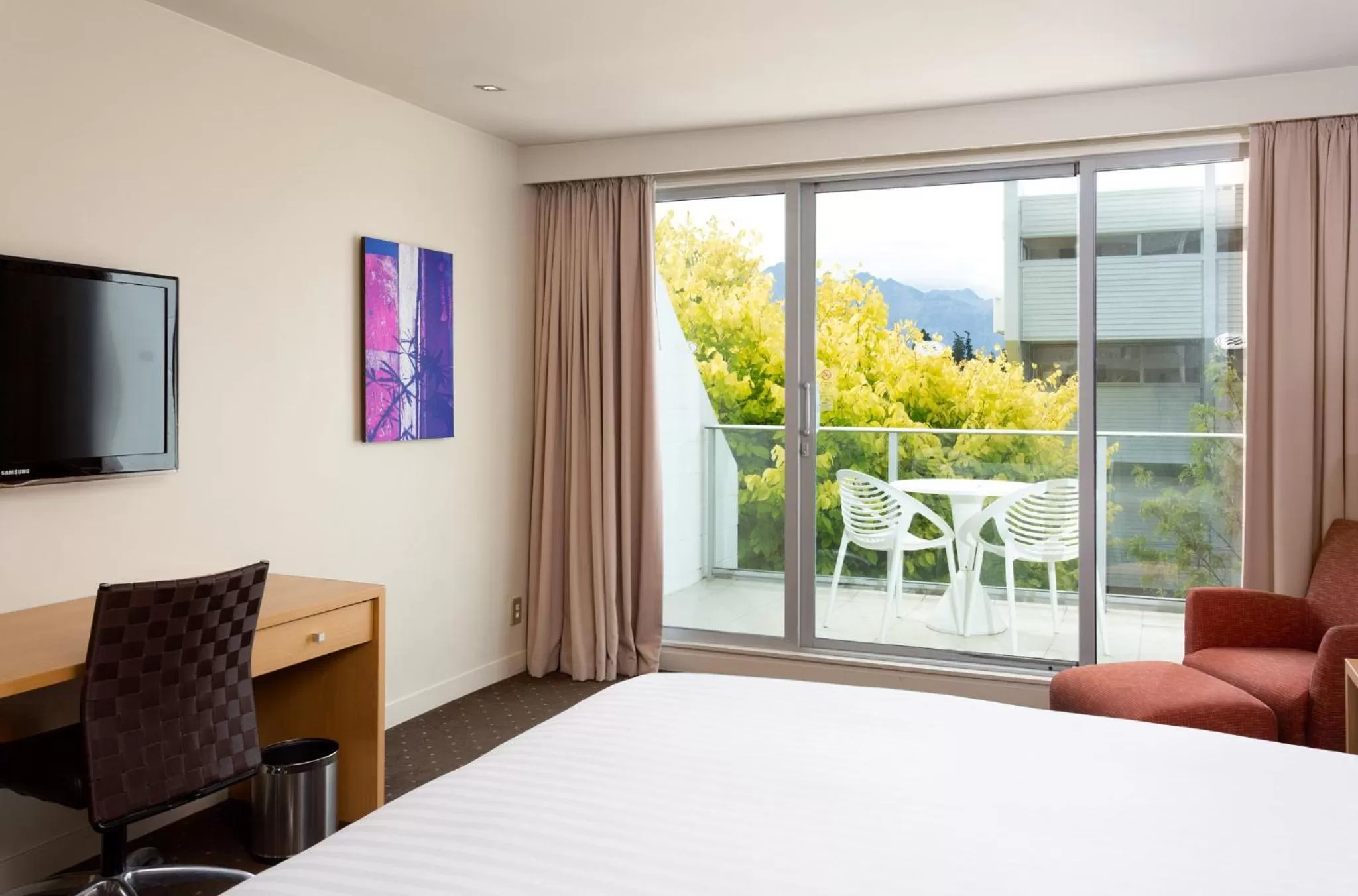 Photo of the whole room, Bed in Crowne Plaza Queenstown by IHG