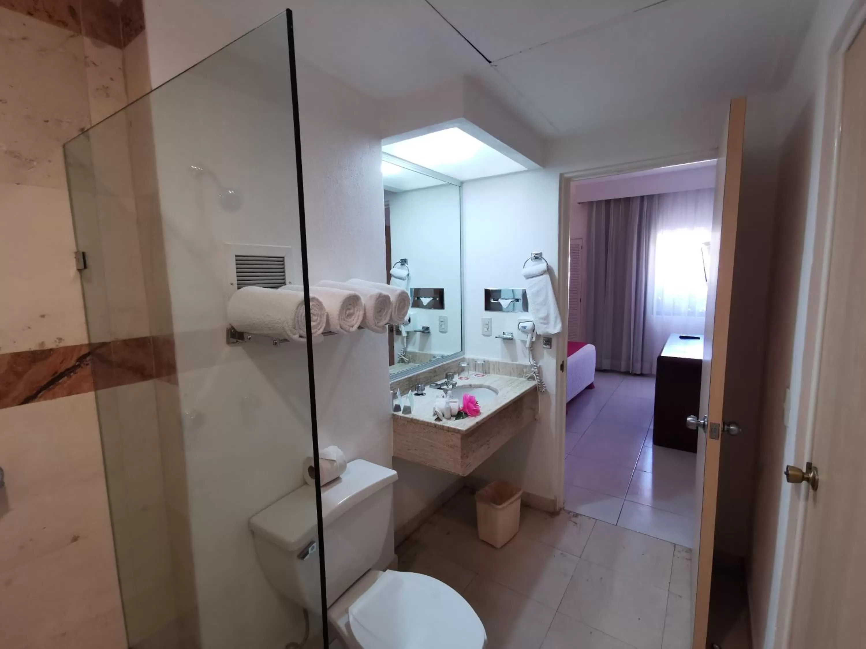 Bathroom, Bed in Canto del Sol Puerto Vallarta All Inclusive