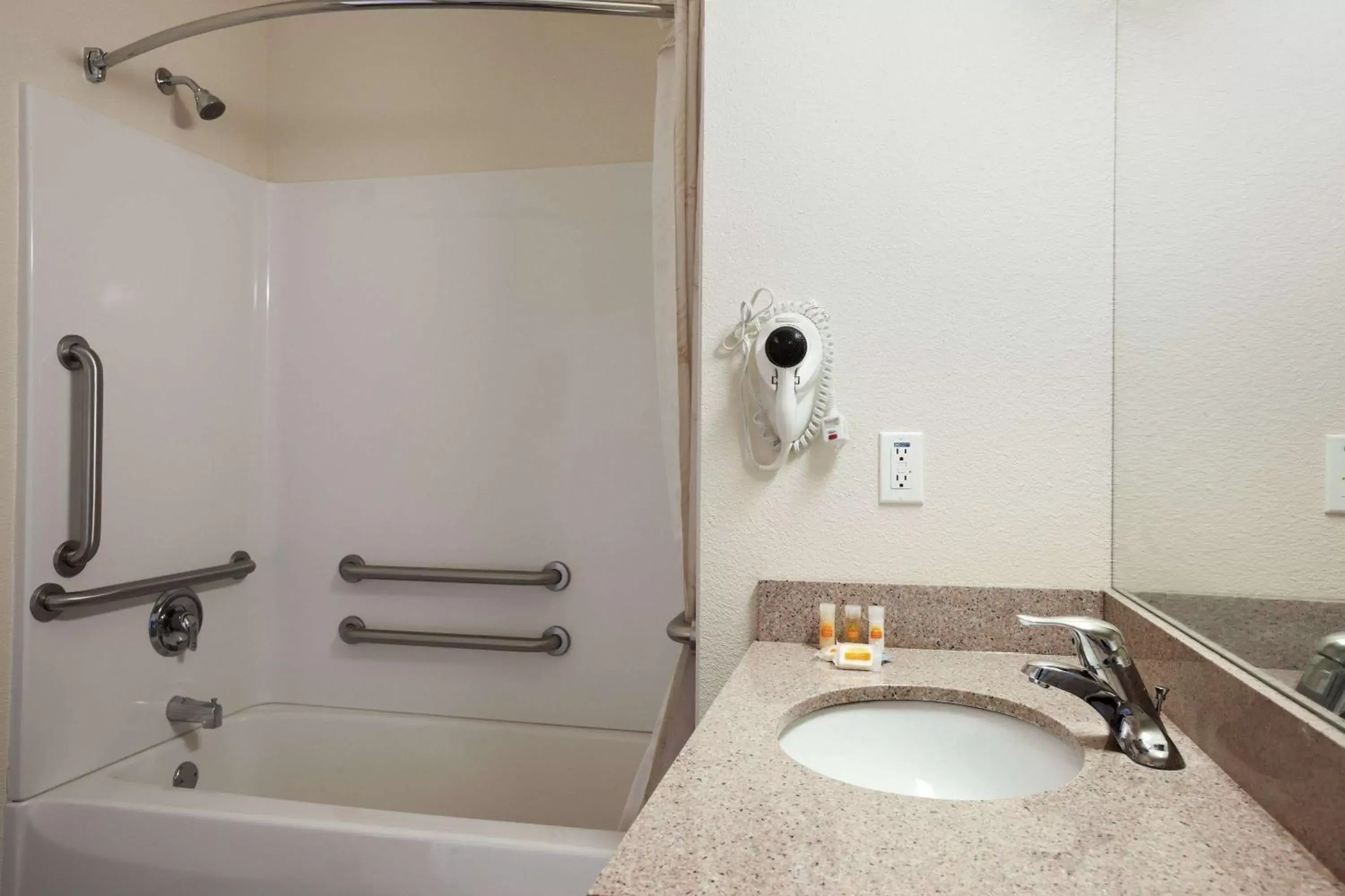 Bathroom in Days Inn & Suites by Wyndham Columbus NE