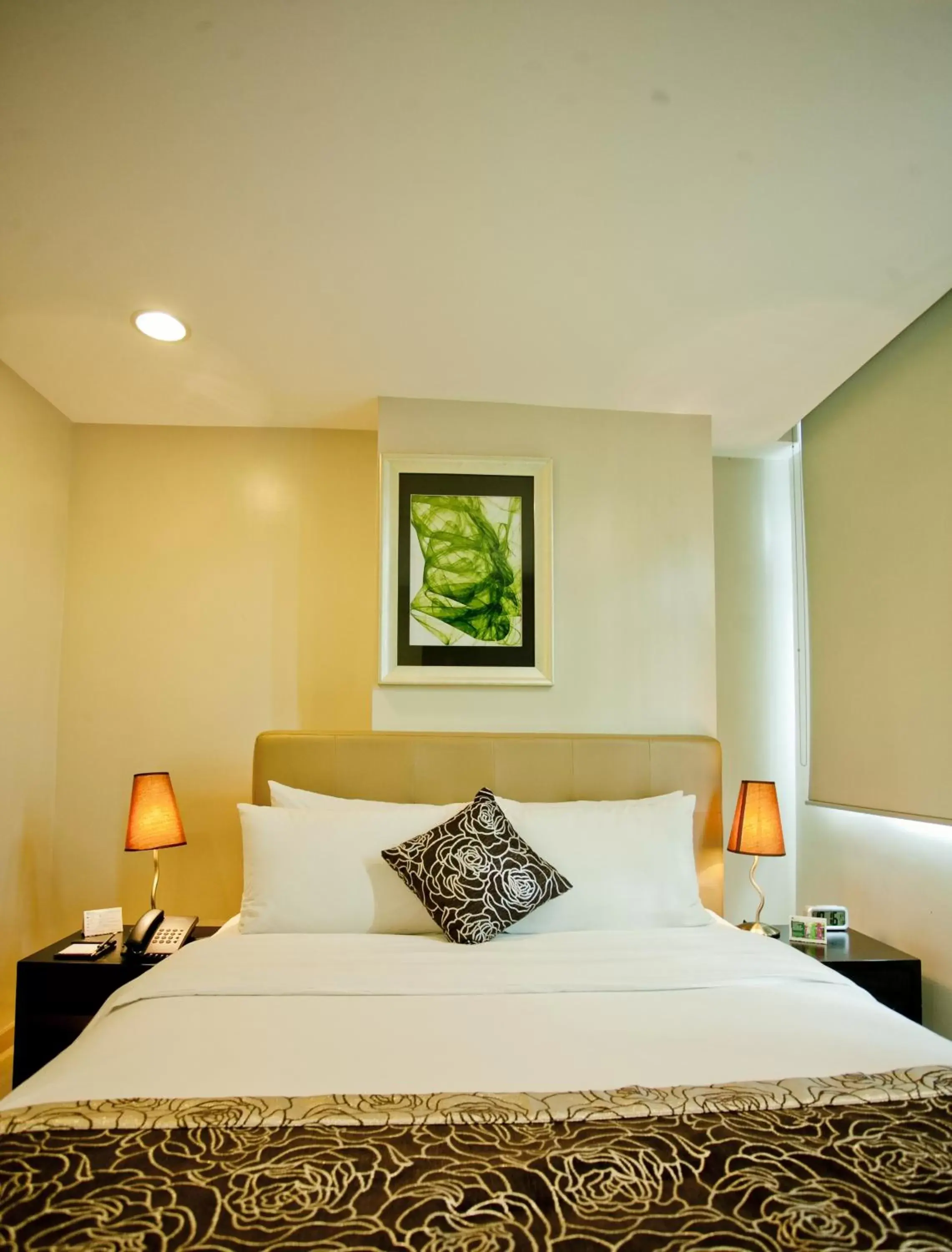 Bed in The Exchange Regency Residence Hotel Managed by HII