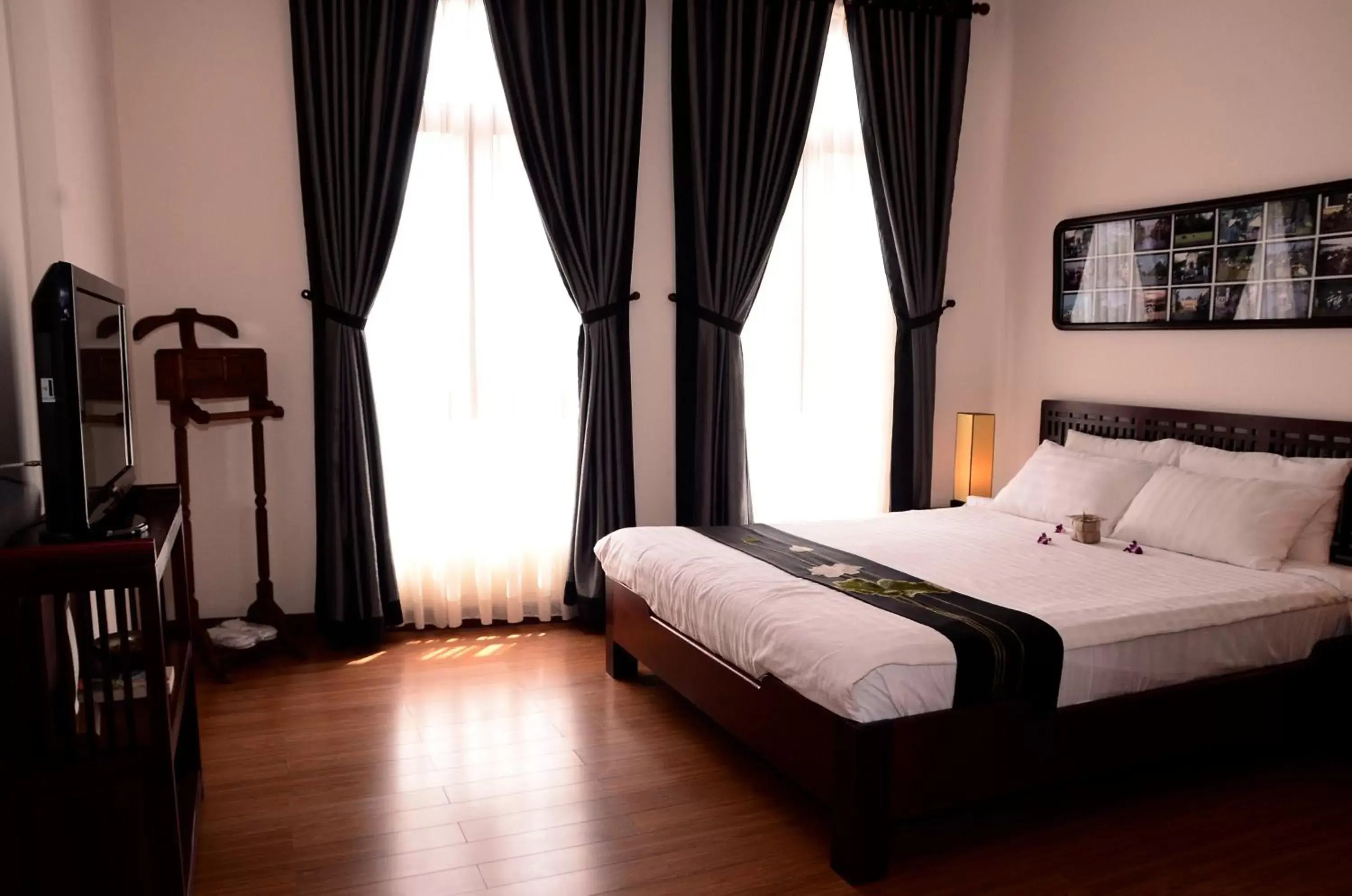 Bed in Nam Bo Boutique Hotel