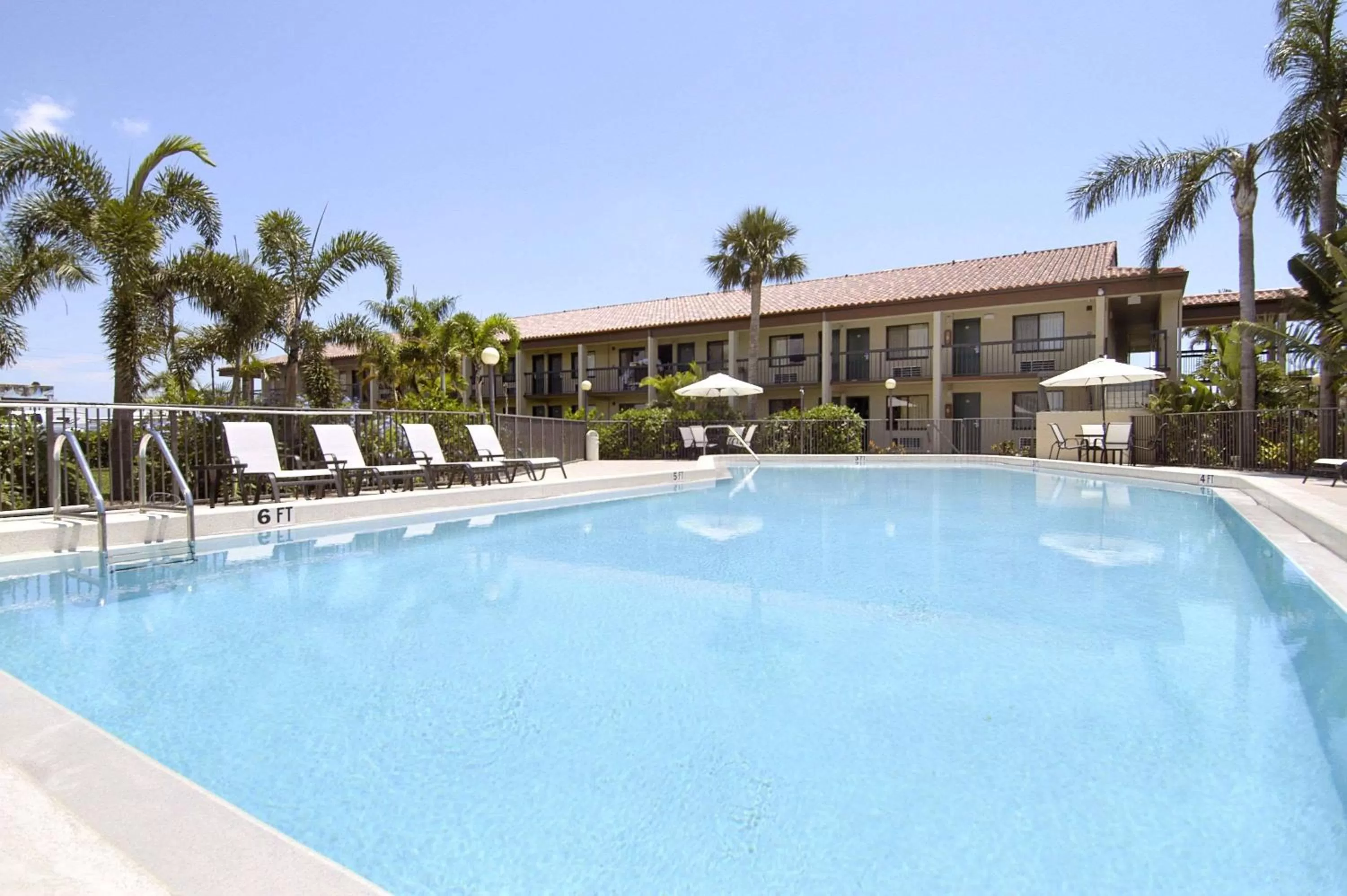 Swimming pool in Super 8 by Wyndham Riviera Beach West Palm Beach