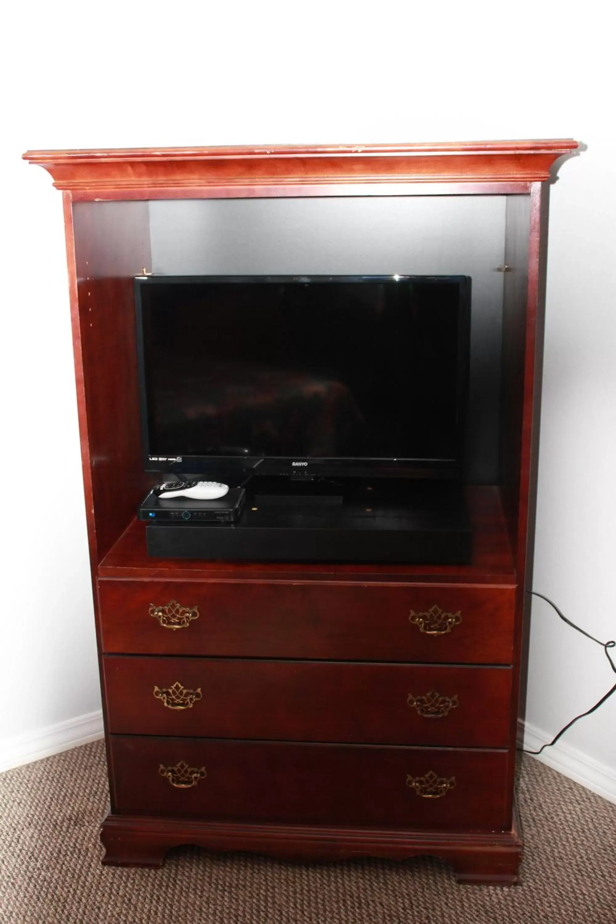 Decorative detail, TV/Entertainment Center in Brydan Suites