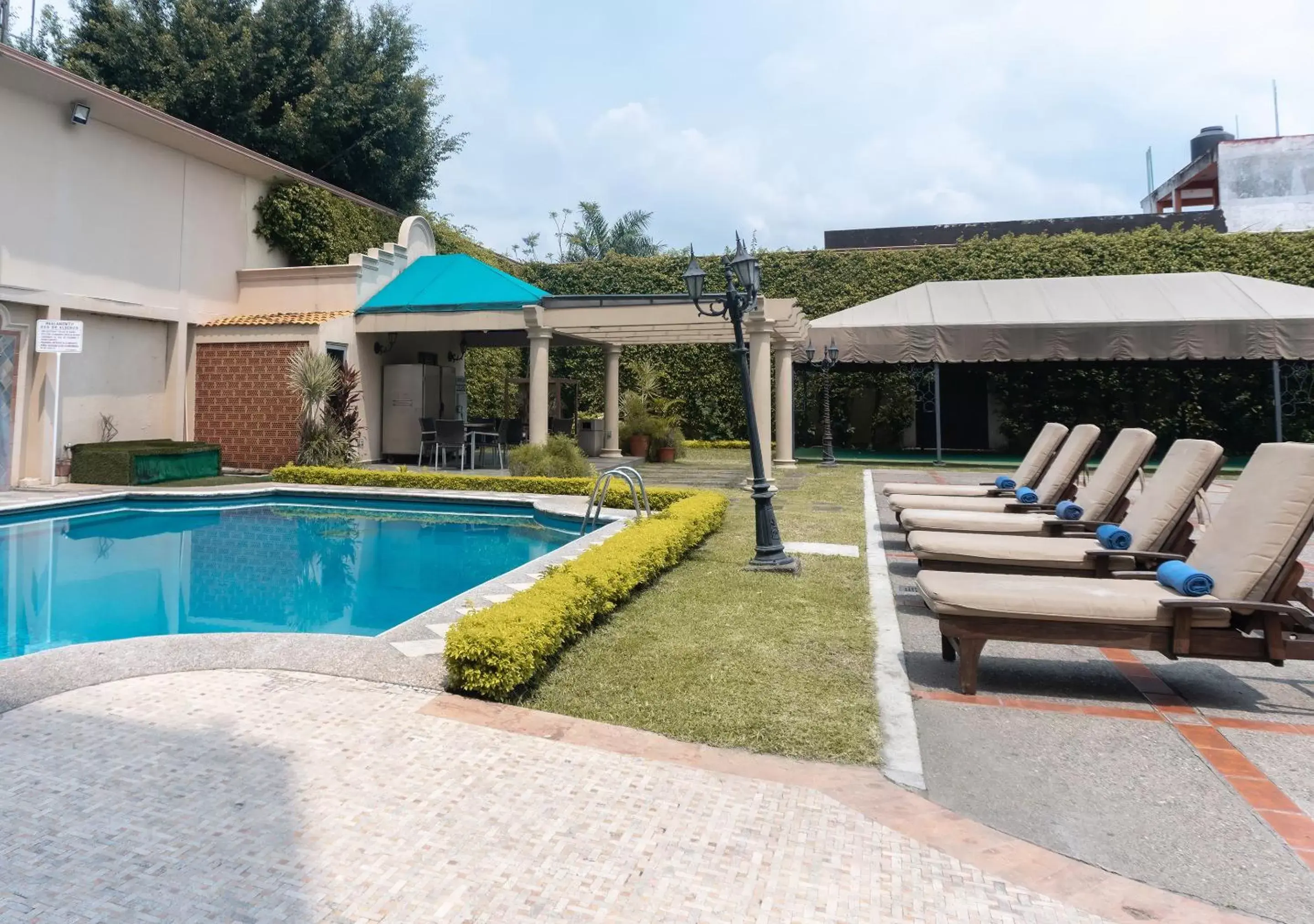 Pool view, Swimming Pool in Hotel Victoria Poza Rica by Brahma