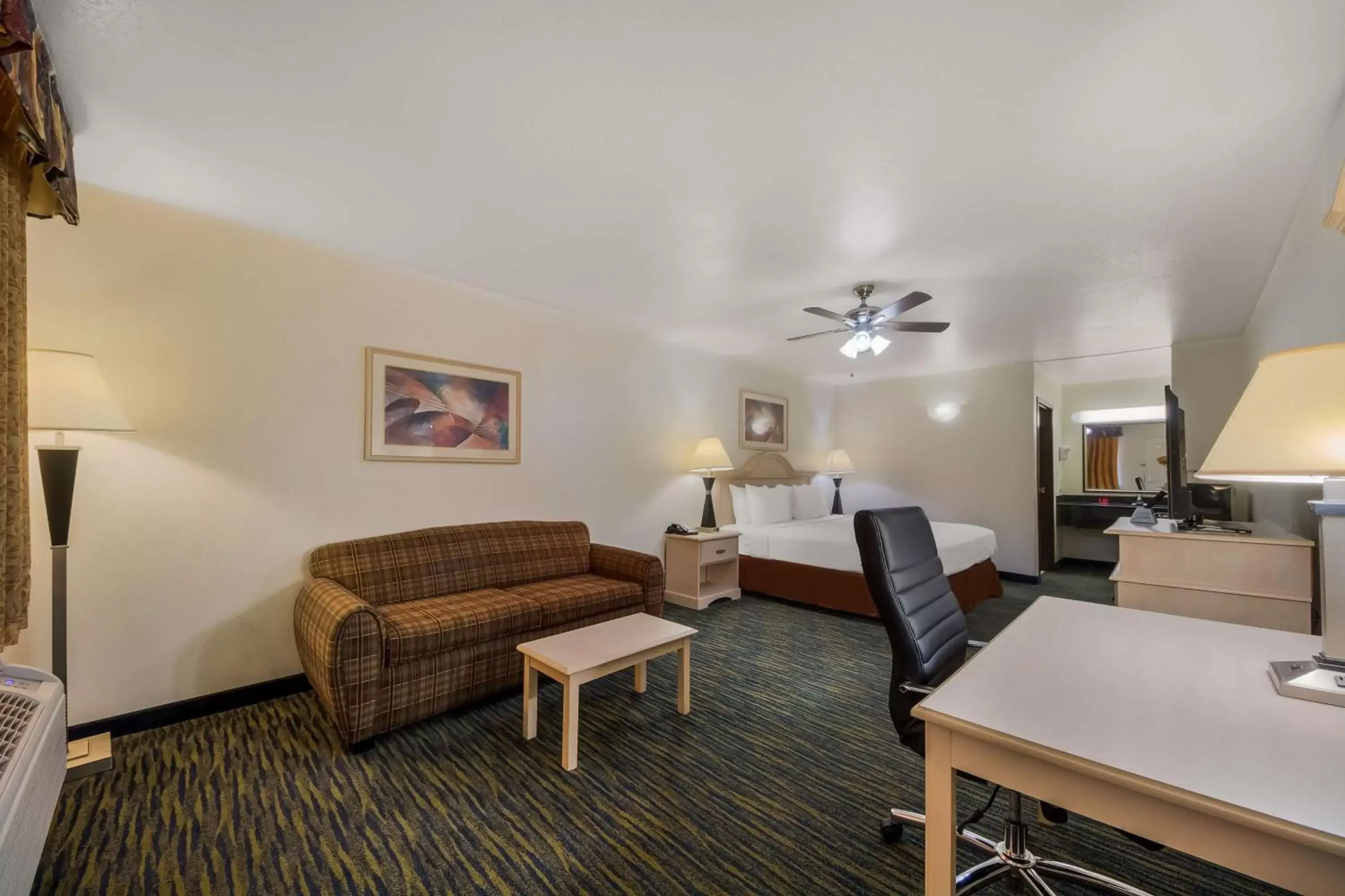 Bedroom, Seating Area in SureStay Hotel by Best Western Falfurrias