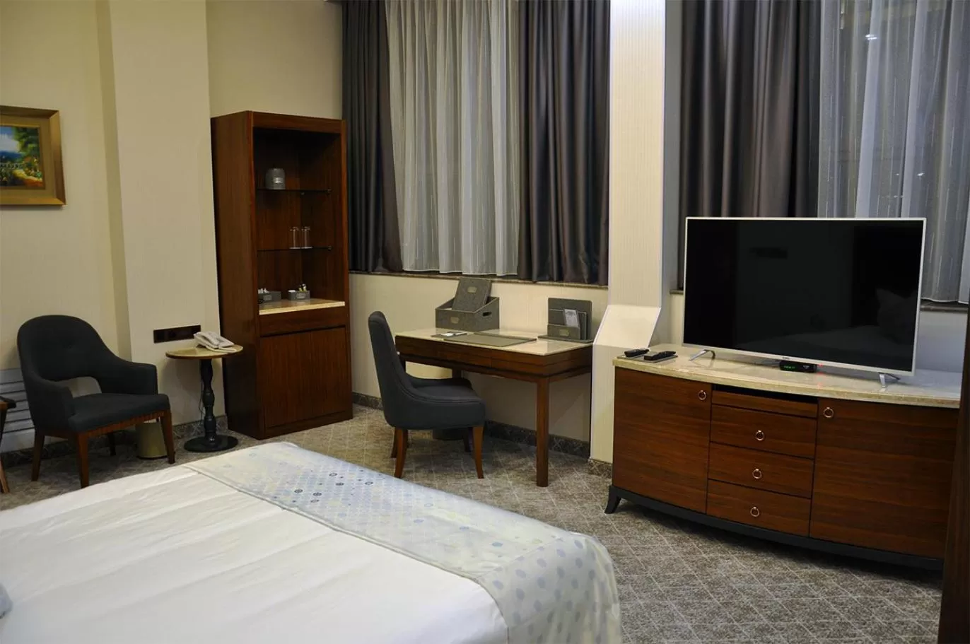 Bed in Parliament Palace Hotel