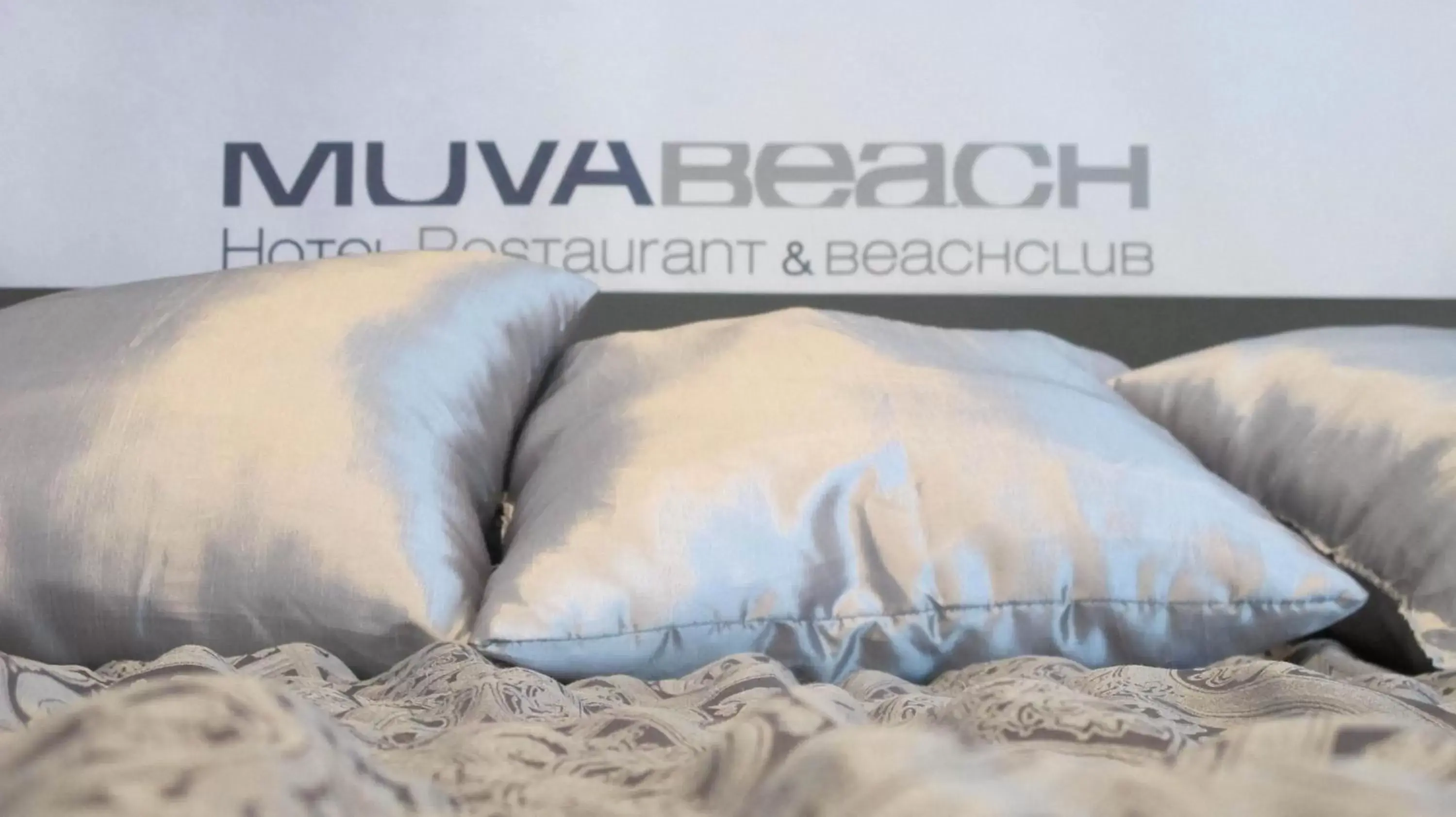 Bed in Hotel Muva Beach