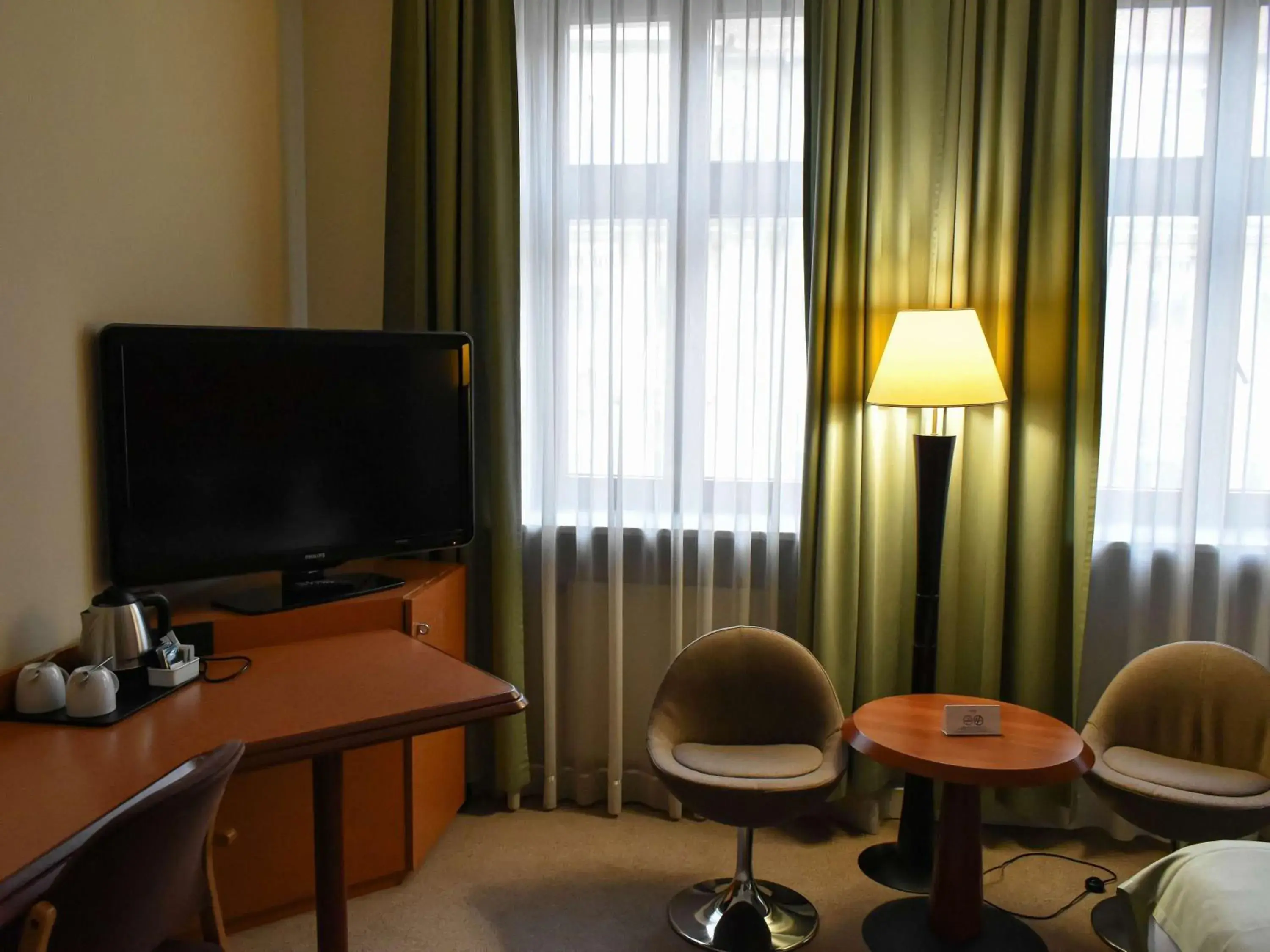 Bedroom, TV/Entertainment Center in Mercure Opole