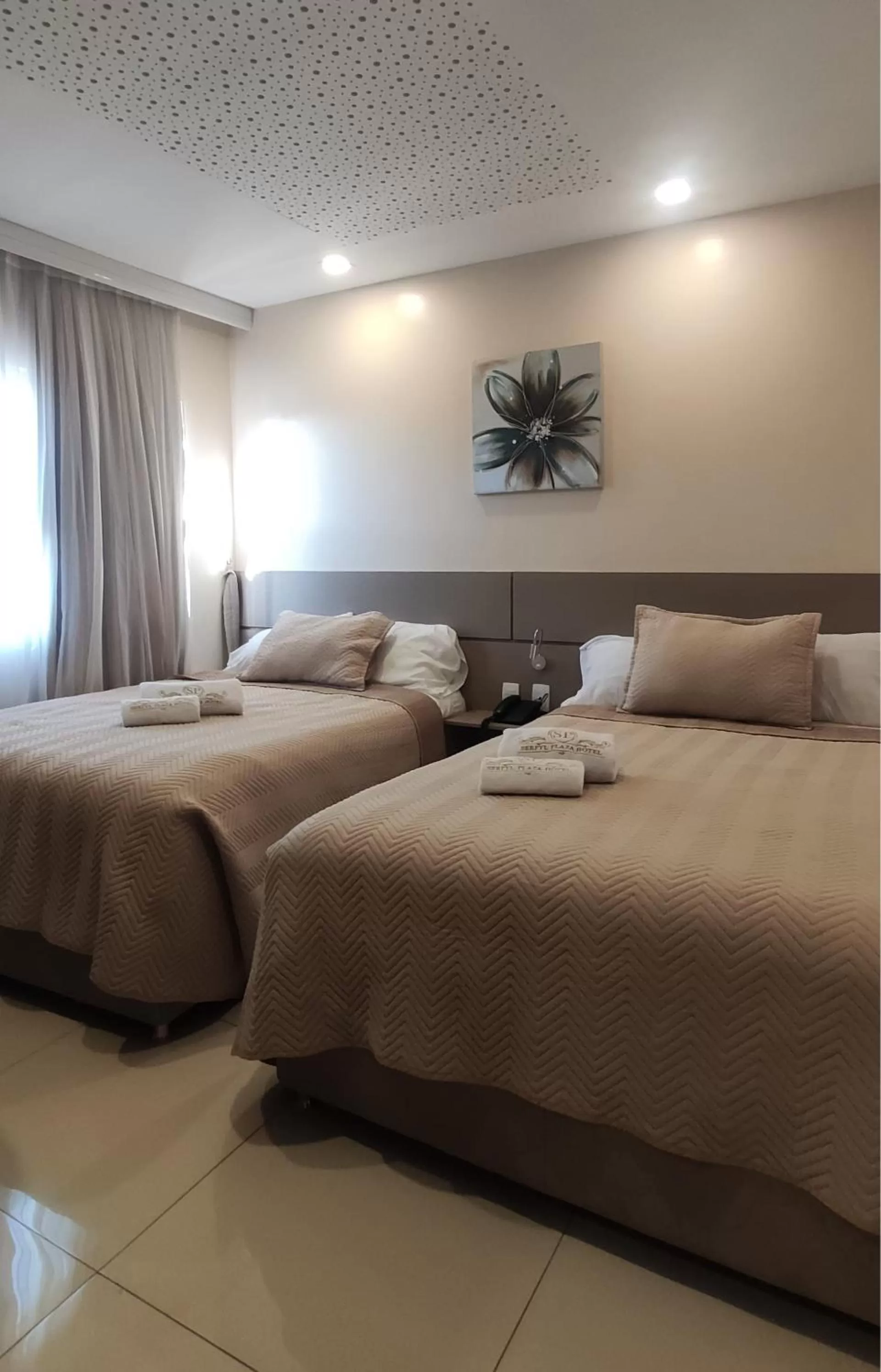 View (from property/room), Bed in SERPYL Plaza Hotel