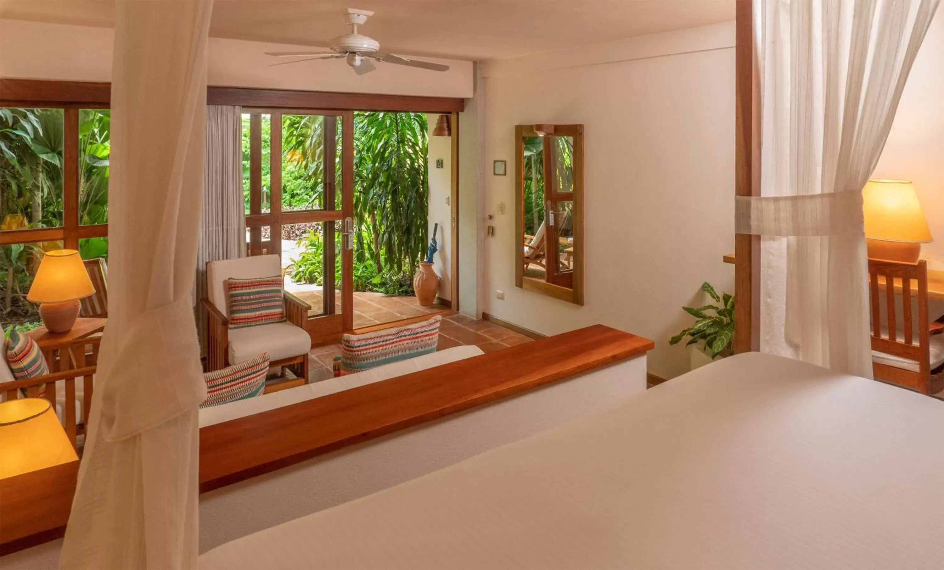 Bedroom in Capitán Suizo Beachfront Boutique Hotel