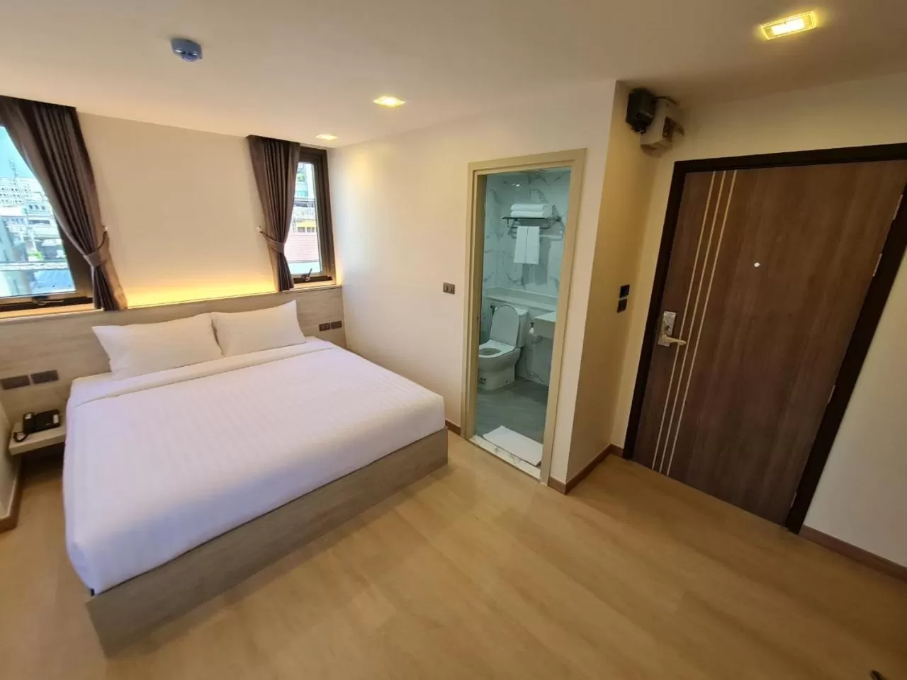 Bed in Thana Wisut Hotel