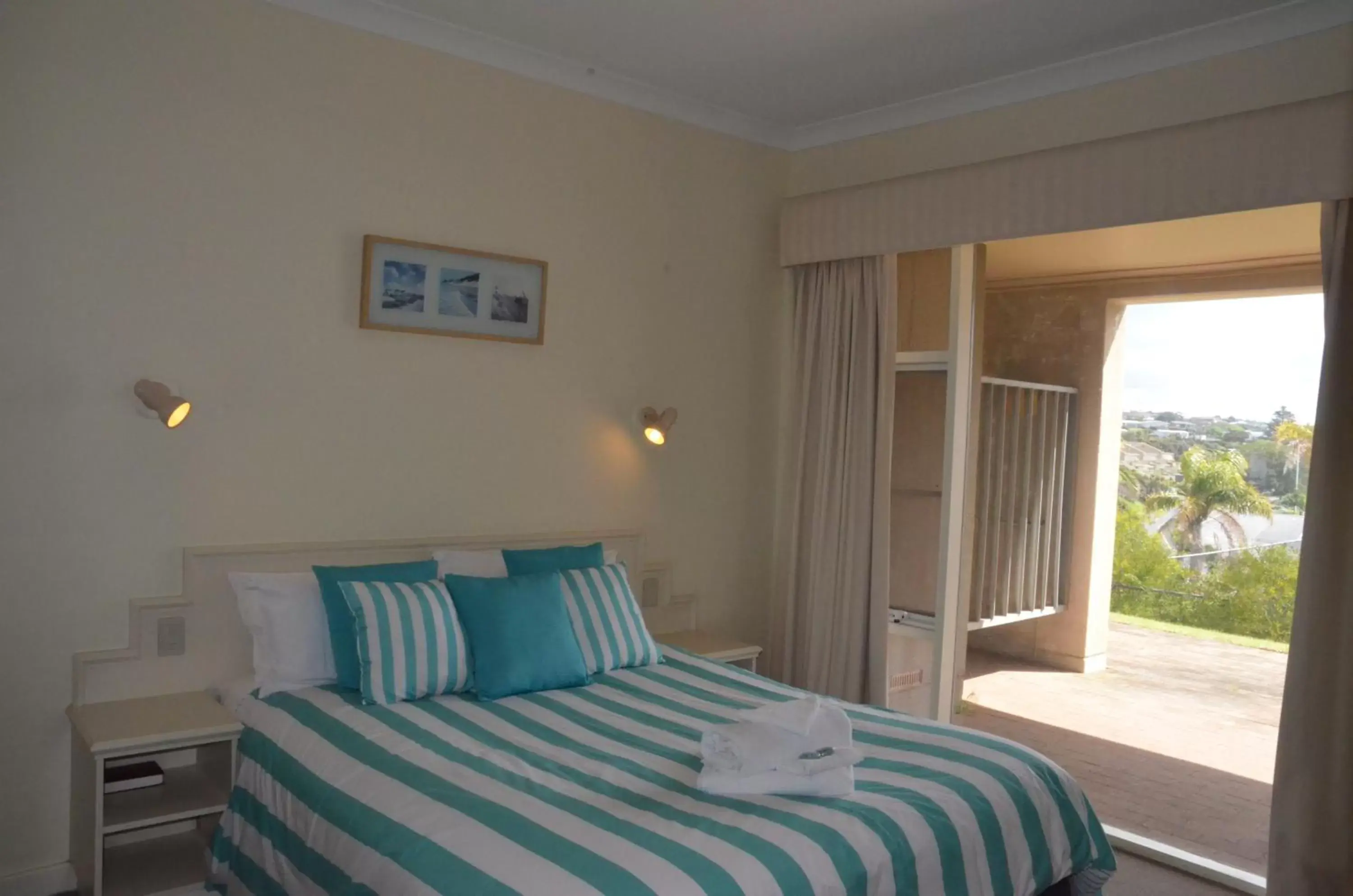 Bed in The Bluff Resort Apartments