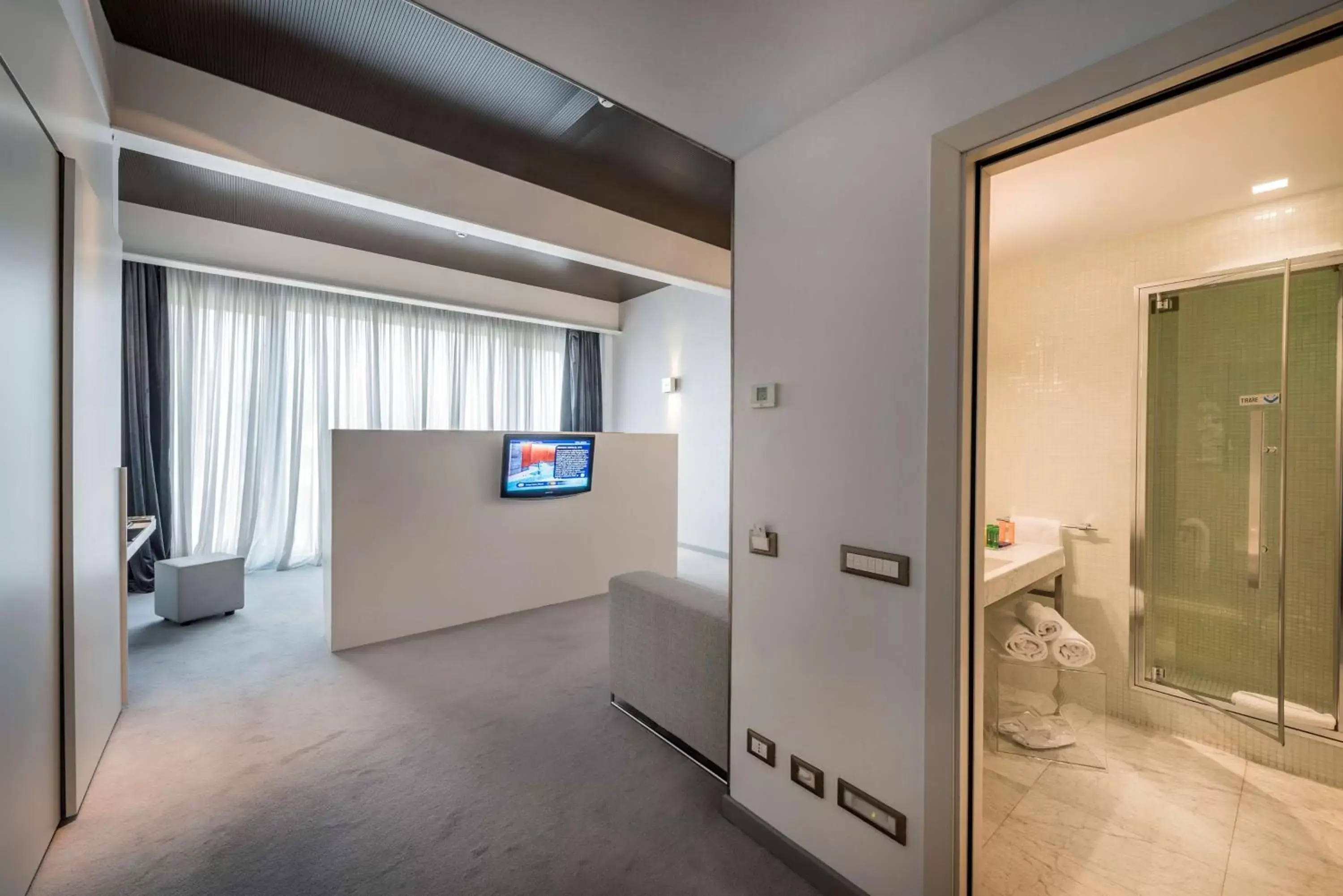 Photo of the whole room, TV/Entertainment Center in Devero Hotel BW Signature Collection