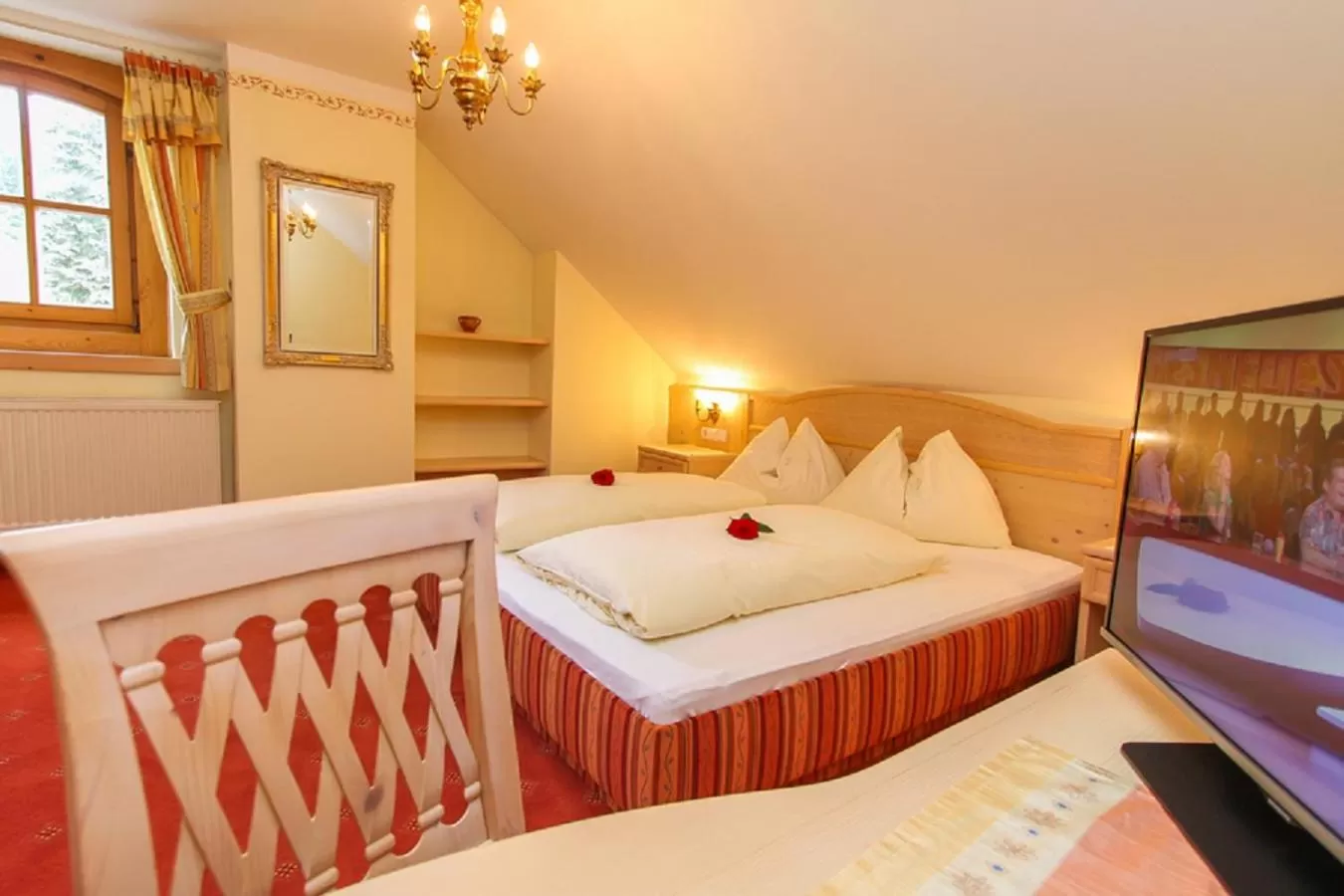 Bed in Zimmer & Ferienwohnungen Dandler