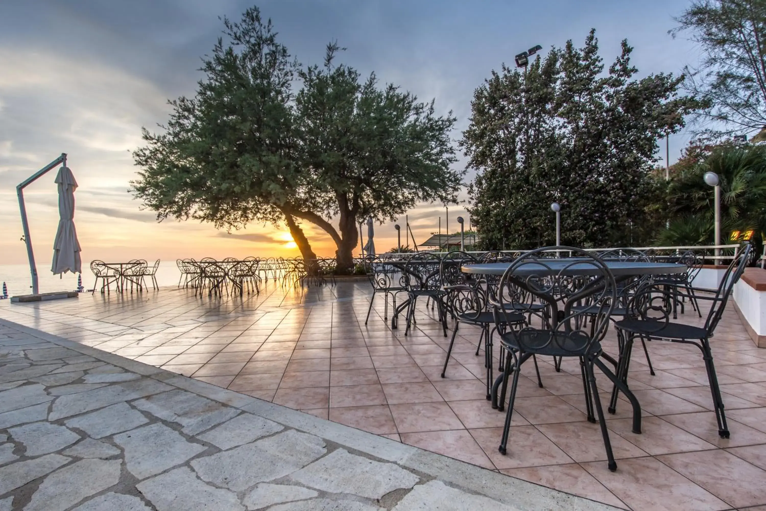 Patio, Swimming Pool in Hotel Poseidon