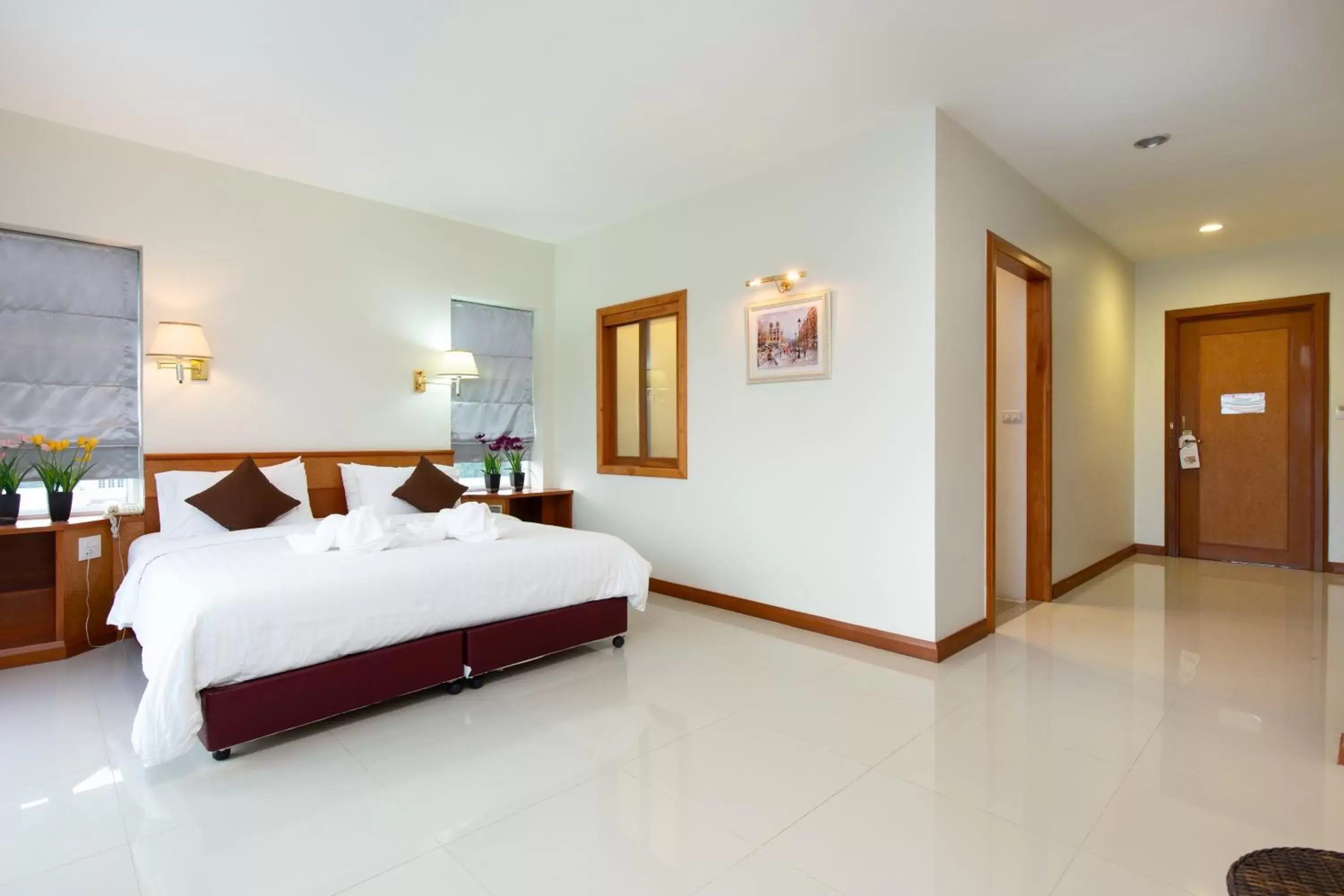 Bed in Kanchanaburi City Hotel - SHA Extra Plus