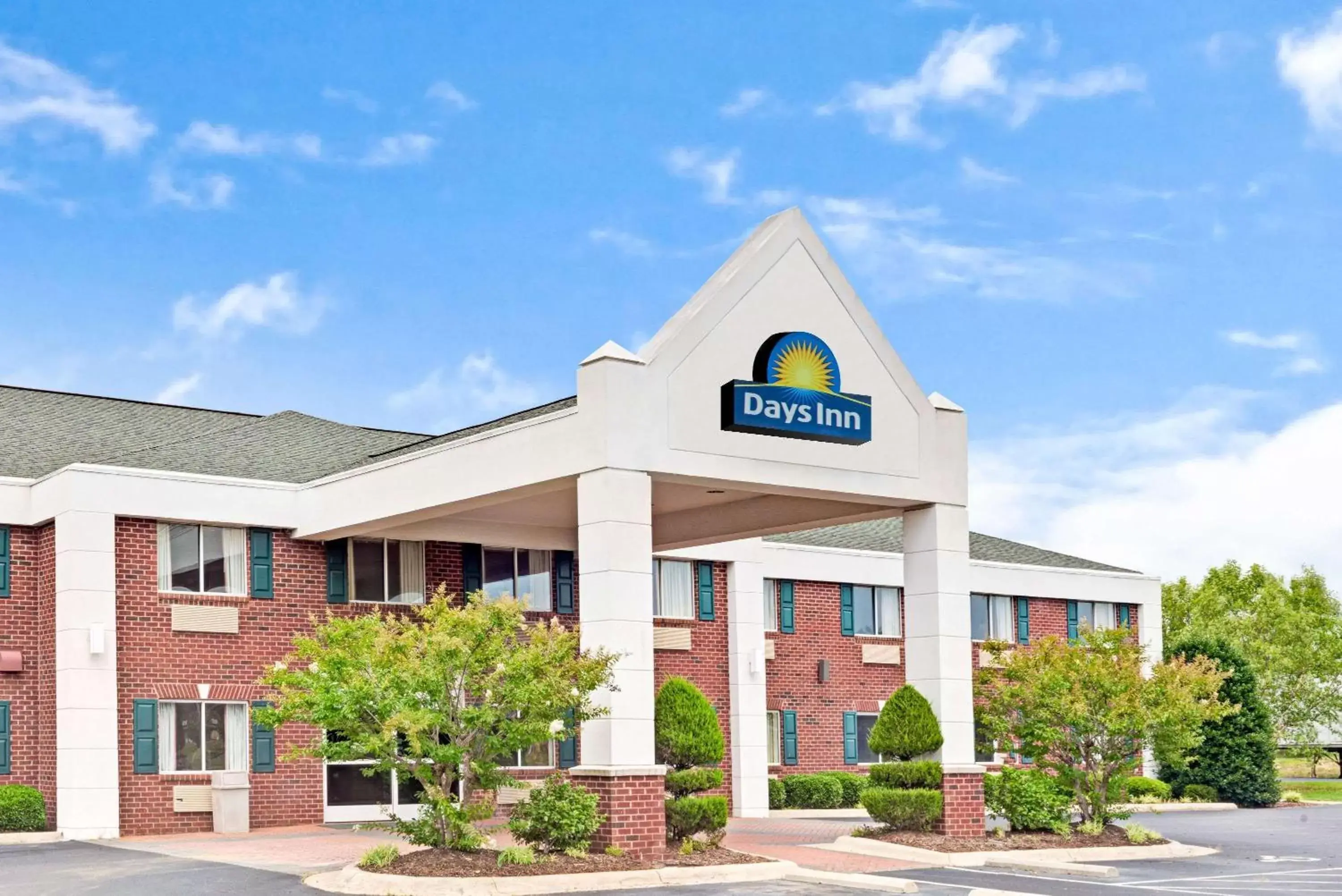 Property building in Days Inn & Suites by Wyndham Siler City