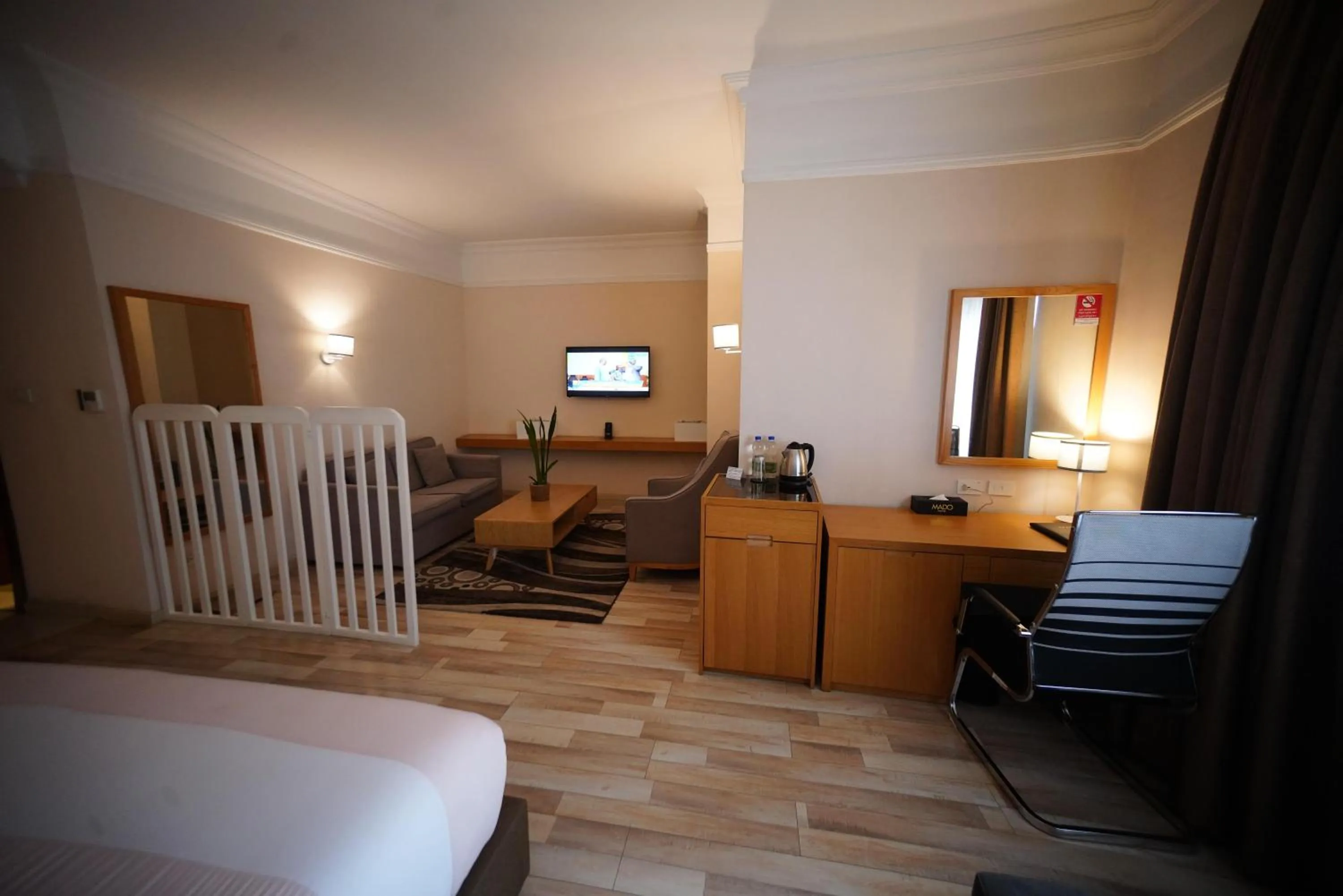 TV and multimedia, Bed in Mado Hotel