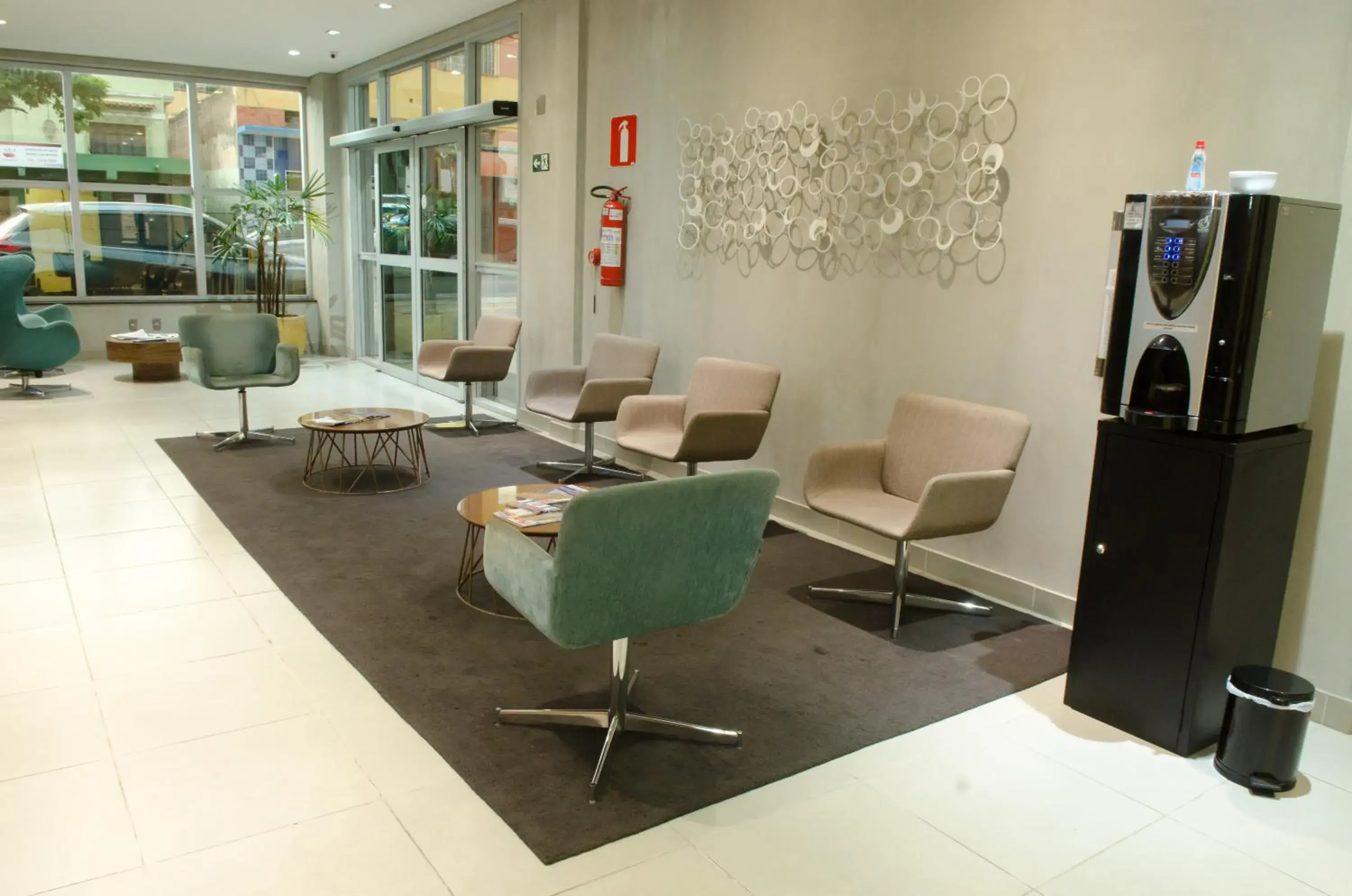 Lobby or reception, Seating Area in Ímpar Suítes Expominas