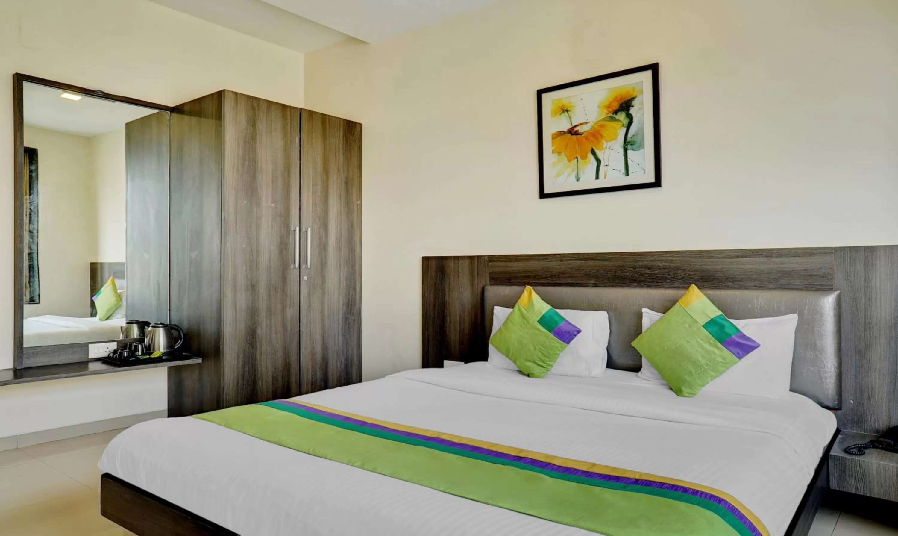 Bedroom, Bed in Treebo Bhagyashree Executive