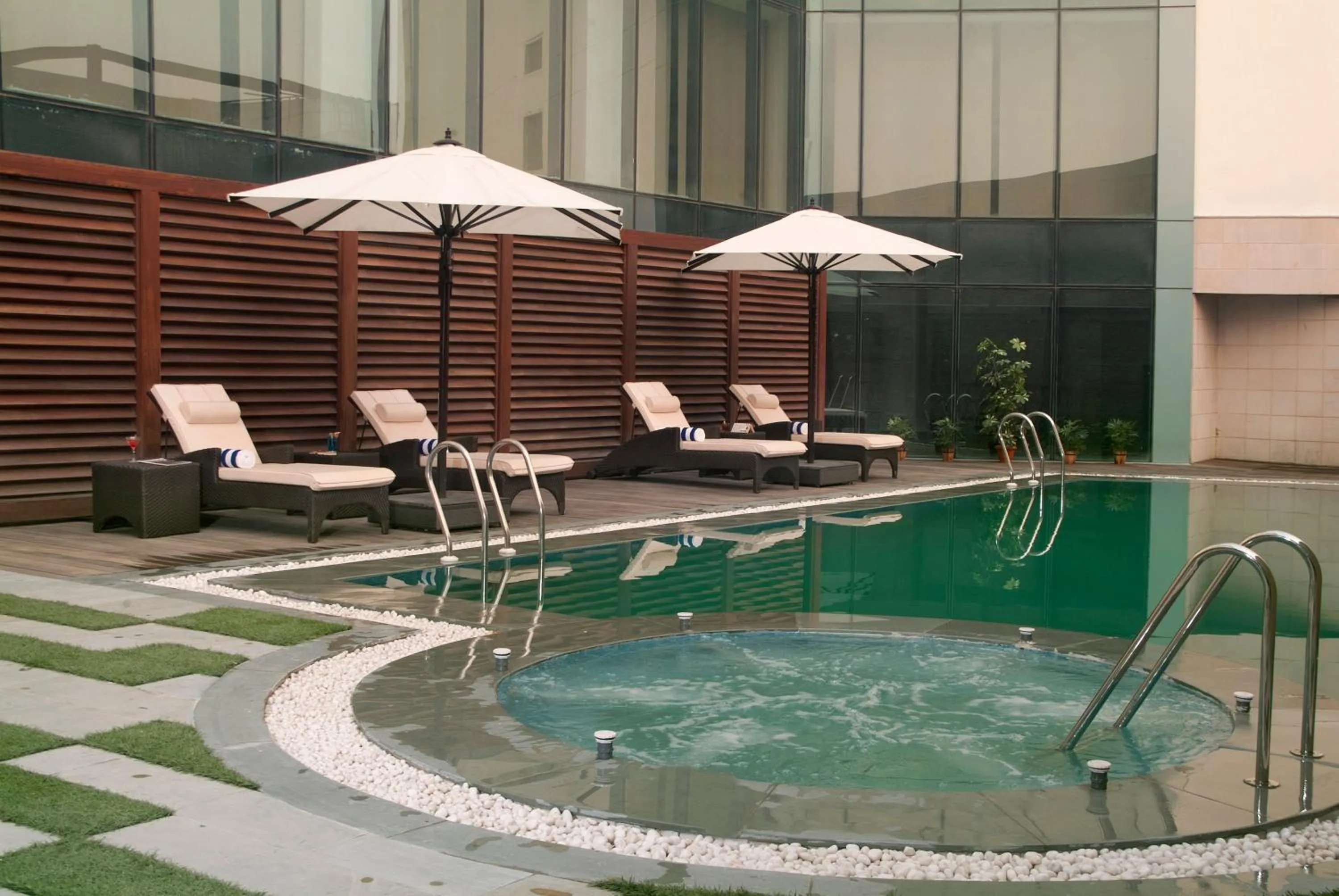 Swimming pool in Savoy Suites Greater Noida