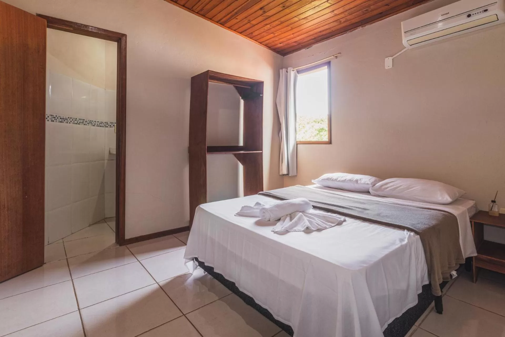 Bed in Pousada La Cabana