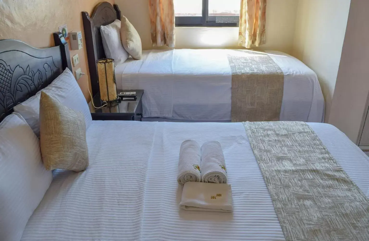 Bed in Hotel Bucaneros Isla Mujeres