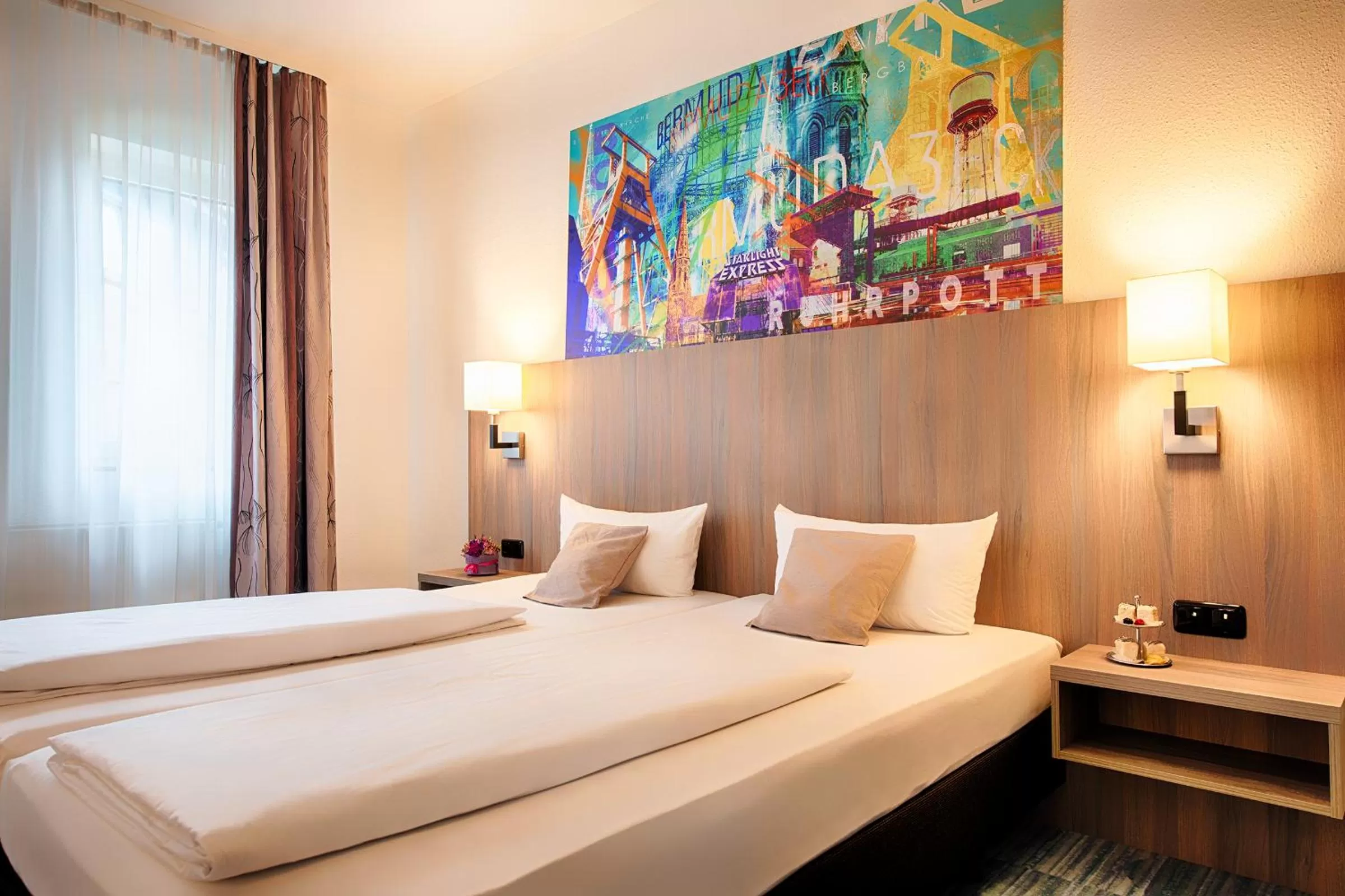 Bed in ACHAT Hotel Bochum Dortmund